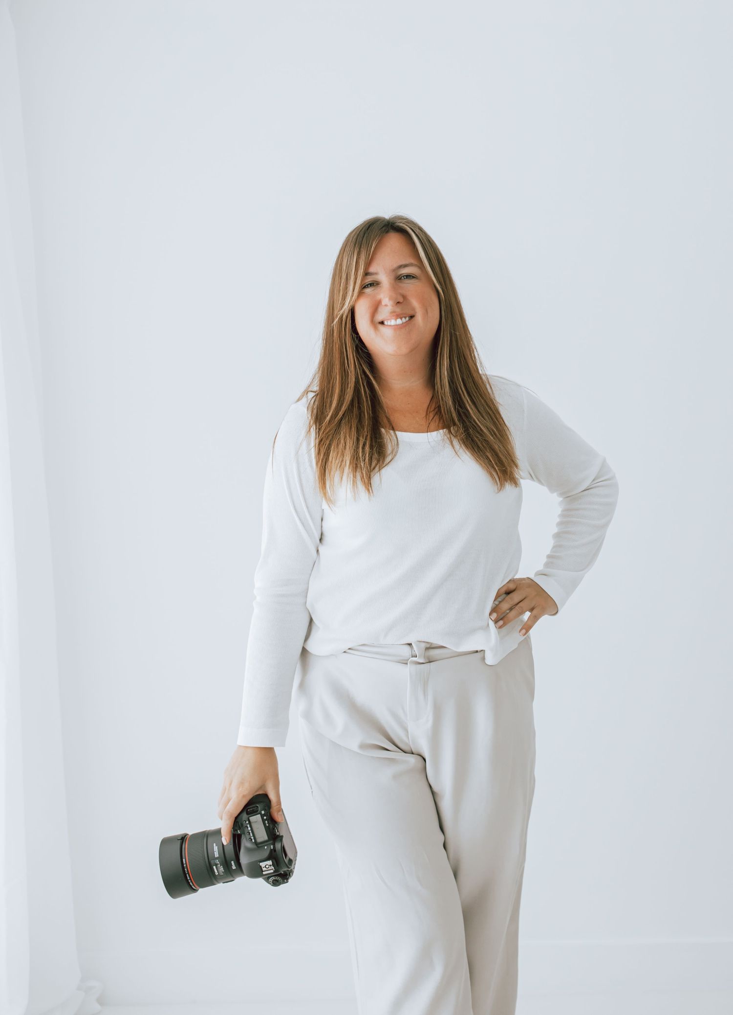 Rachael Plaxton stood with camera