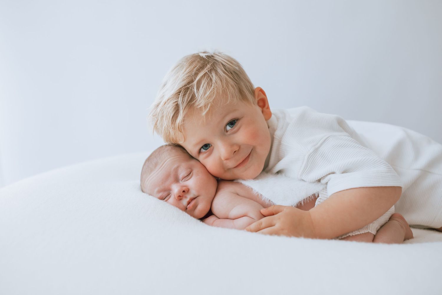 Young boy and baby sibling