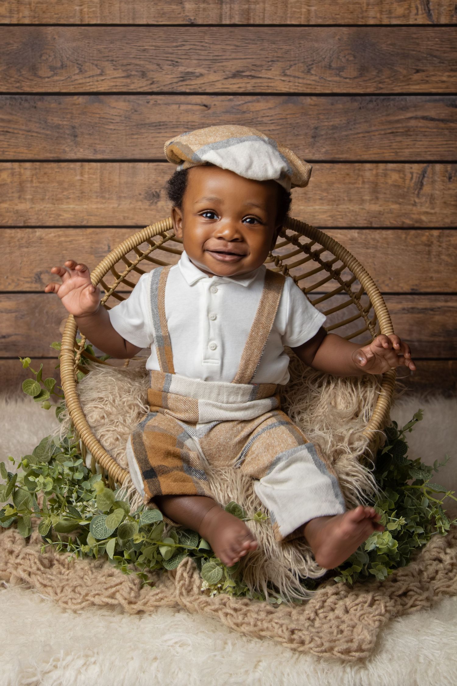 Sitter session baby portrait smiling boy rattan prop Mississauga milestone photographer