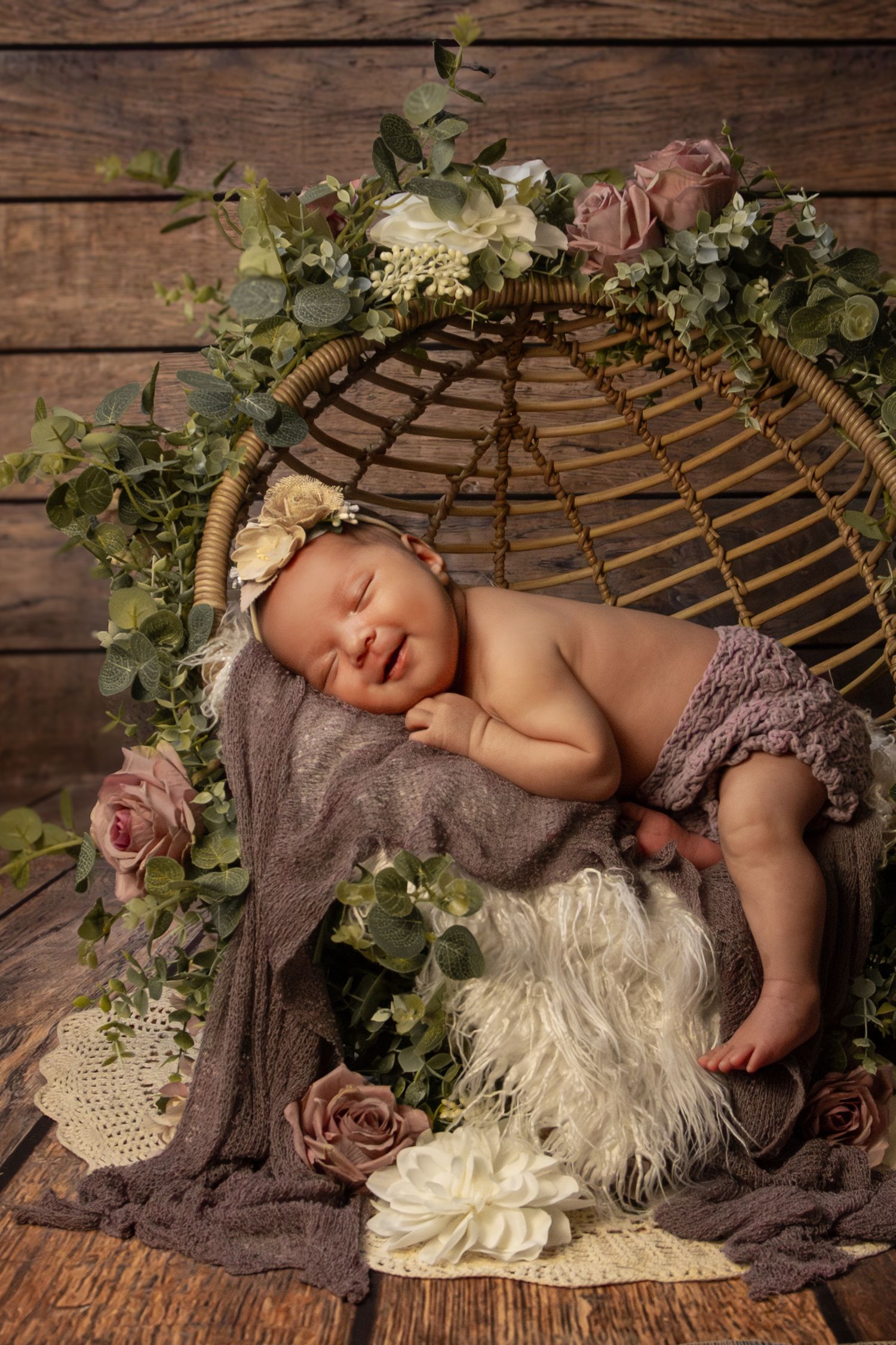 Smiling newborn girl