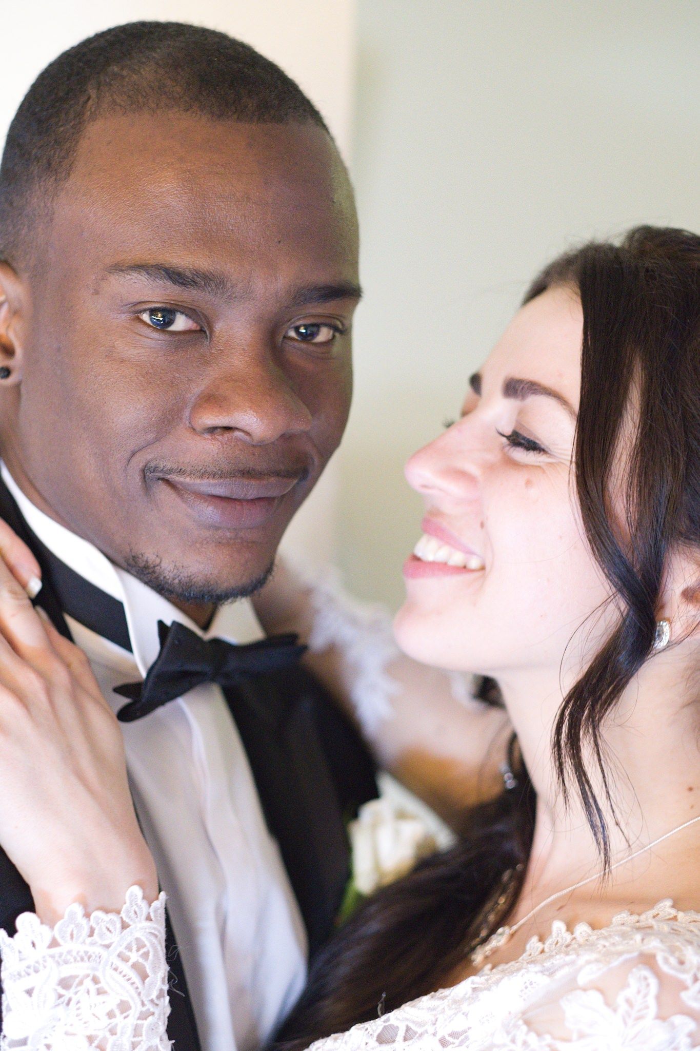 Wedding portrait, couple in each others arms in love