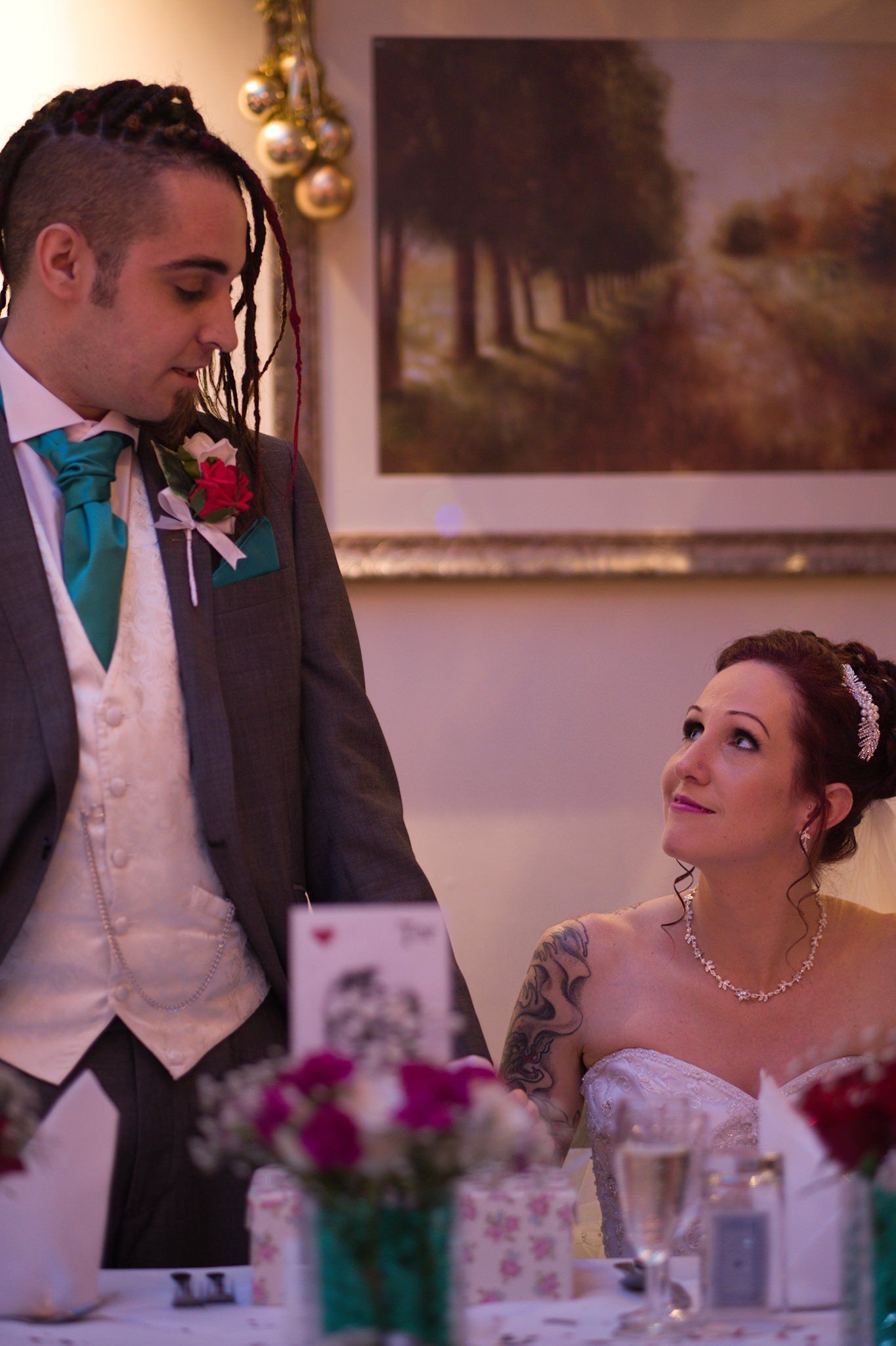 Wedding photo, married couple looking at each other