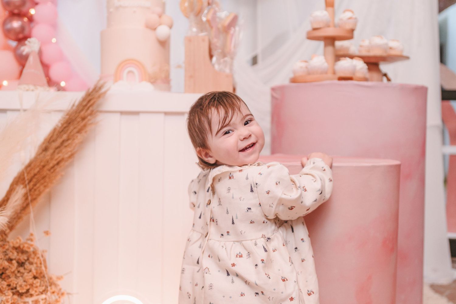A collage of pink-toned lifestyle photos showing someone wearing floral prints against soft pastel backgrounds.