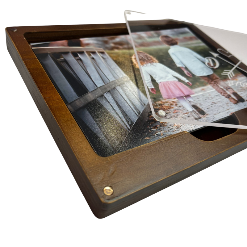 Multiple views of a dark wooden frame with beveled edges displaying a photograph mounted on a light background.