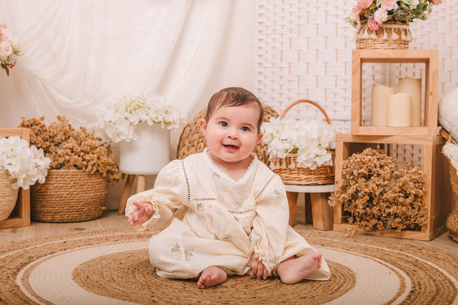 Baby milestone photos with rustic wooden props and neutral color palette.