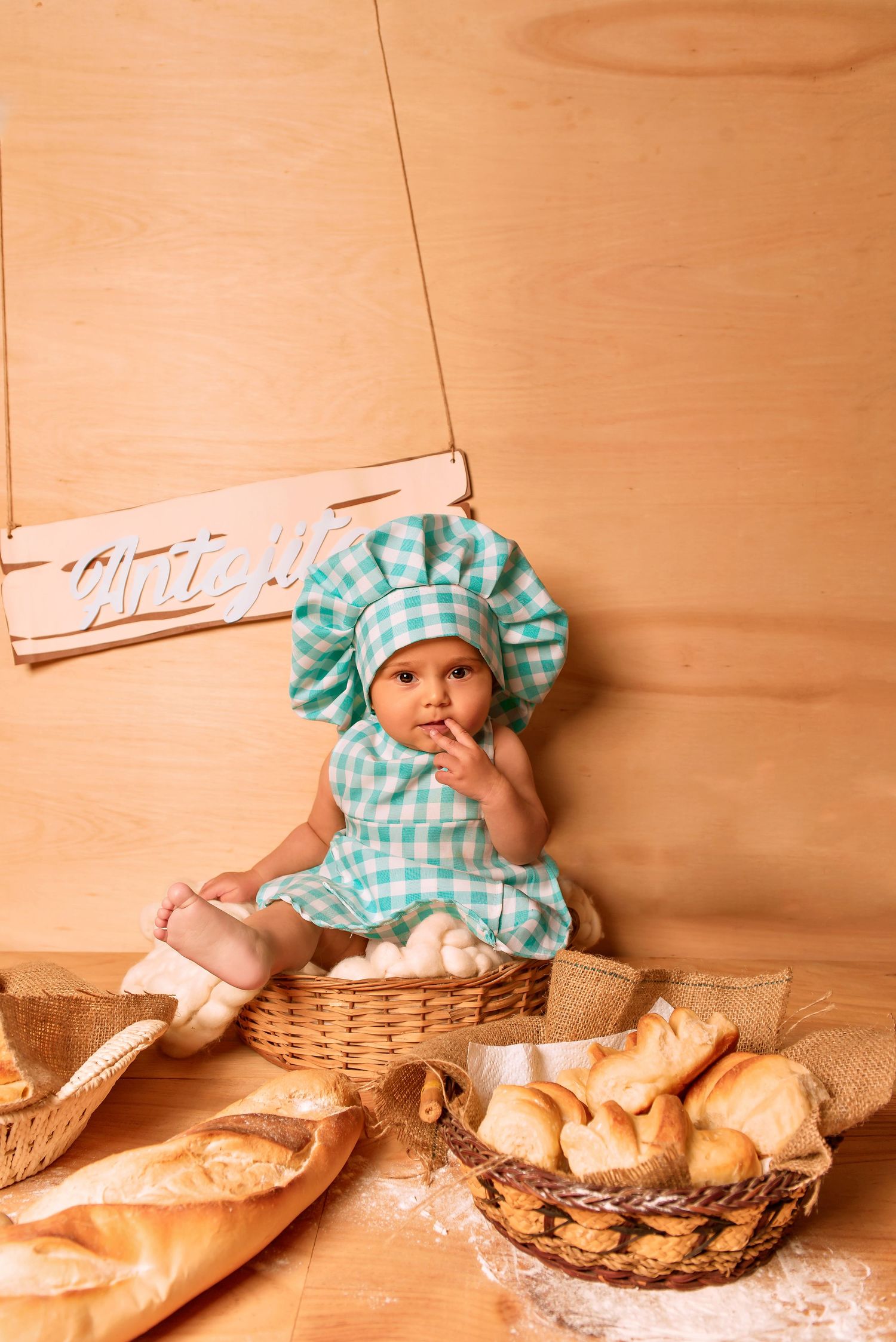 A series of four photos showing baked bread and pastries arranged with a wicker basket against a warm wooden background.