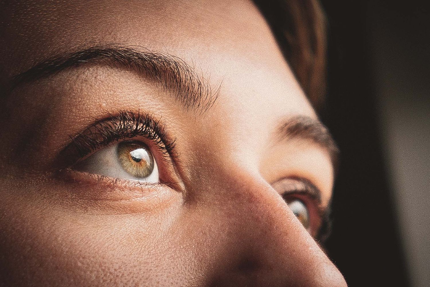 A macro photograph of an eye ball after undergoing a lash lift & tint shot in chesterfield by 21 Photography