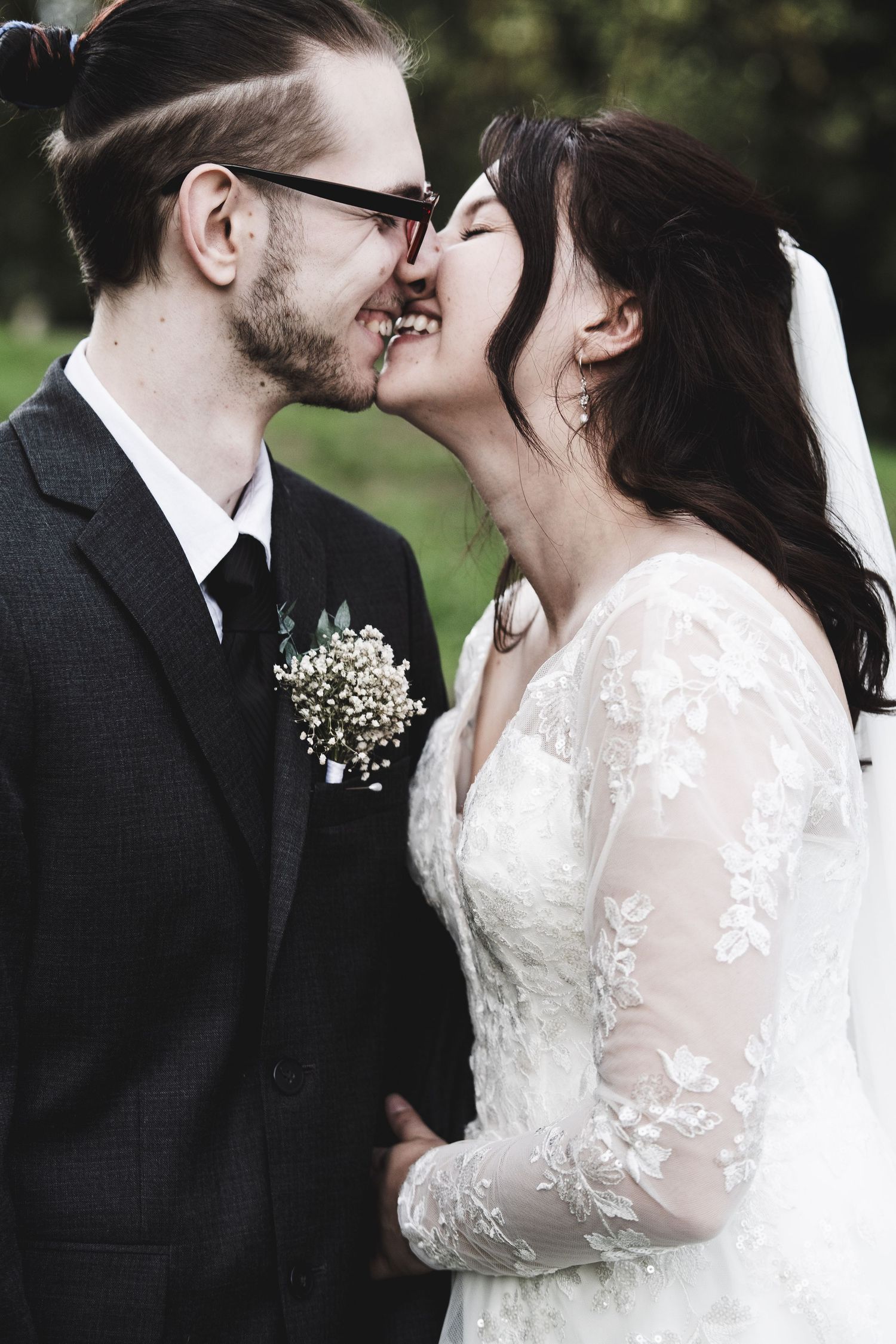 A romantic series of wedding photos showing tender moments between a couple in formal attire with delicate lace details.
