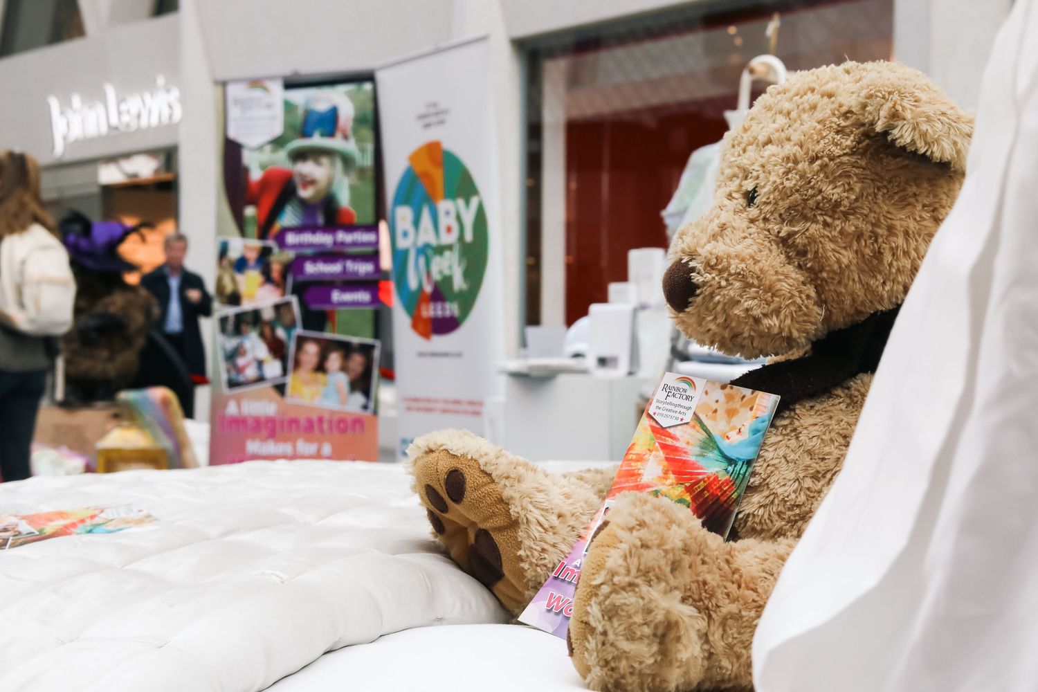 Large teddy bear sitting in a chair at a Baby Show Week event display shot in Leeds by 21 Photography