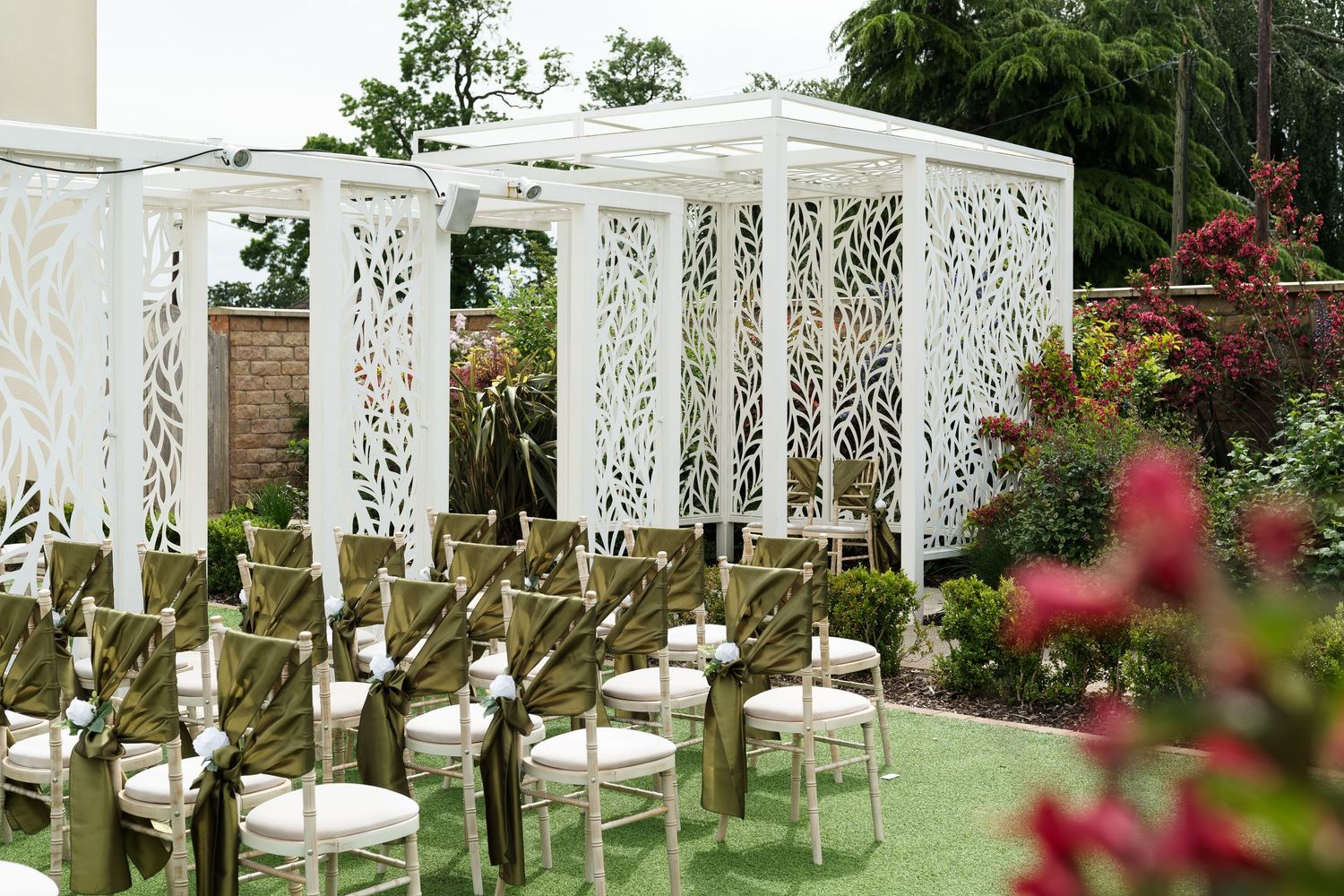 Elegant outdoor wedding ceremony with white floral pavilion and gold chiavari chairs at Wildes Inn, Chesterfield taken by 21 PhotographY