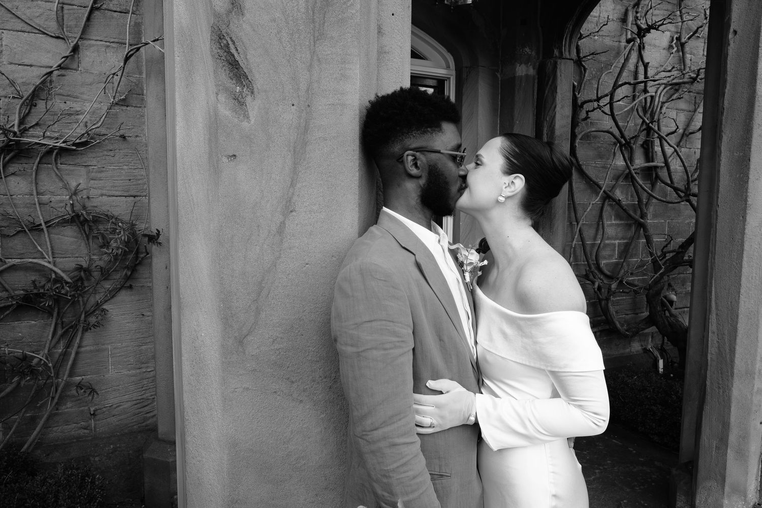 Couple kissing outside Dunston Hall Estate, Chesterfield