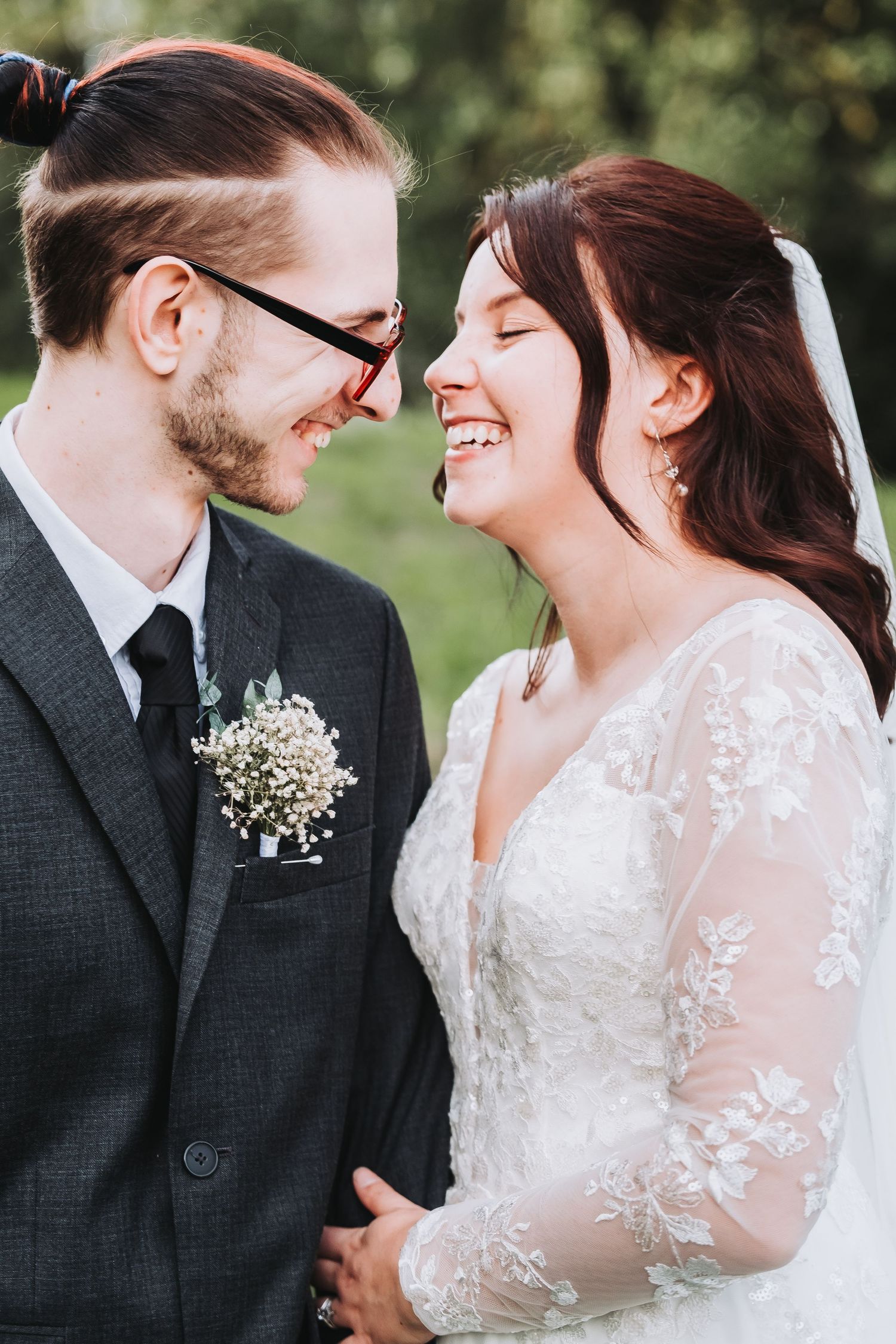 Close-up shots of joyful moments during an outdoor wedding celebration.