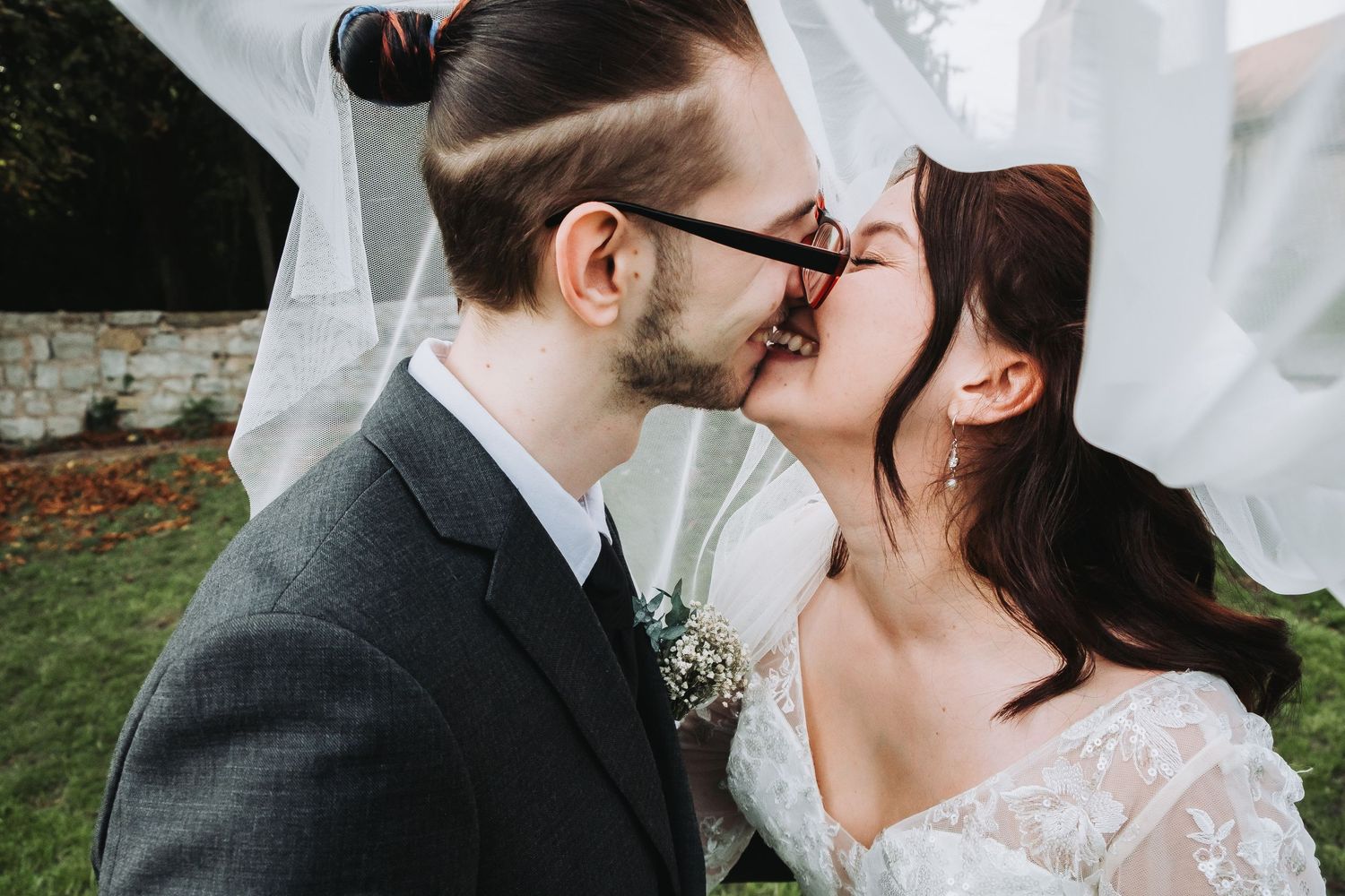 Candid wedding photo series showing intimate moments between newlyweds against a light background.