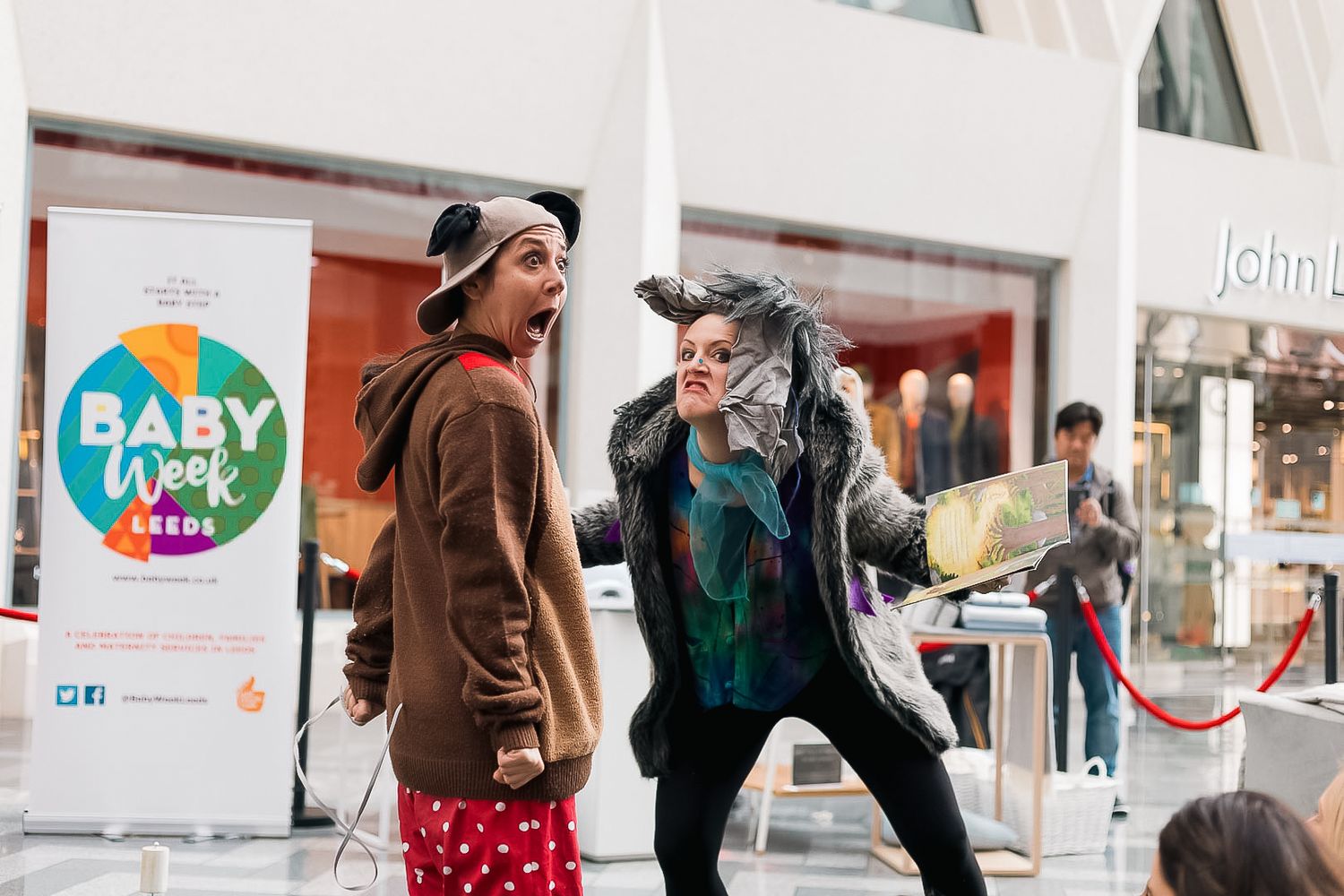 Event participants dance enthusiastically at a Baby Show Week promotional event shot in Leeds by 21 Photography