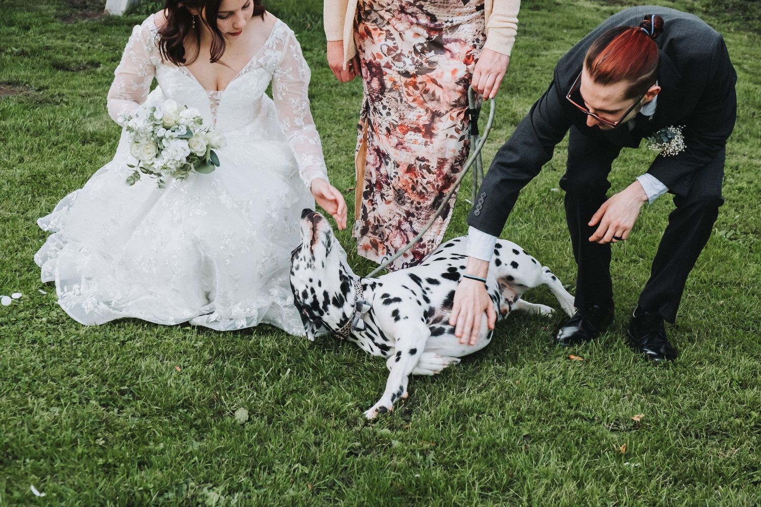 Beloved family dog included in vow renewal photography on the church lawns of St Radegund’s, Derbyshire.