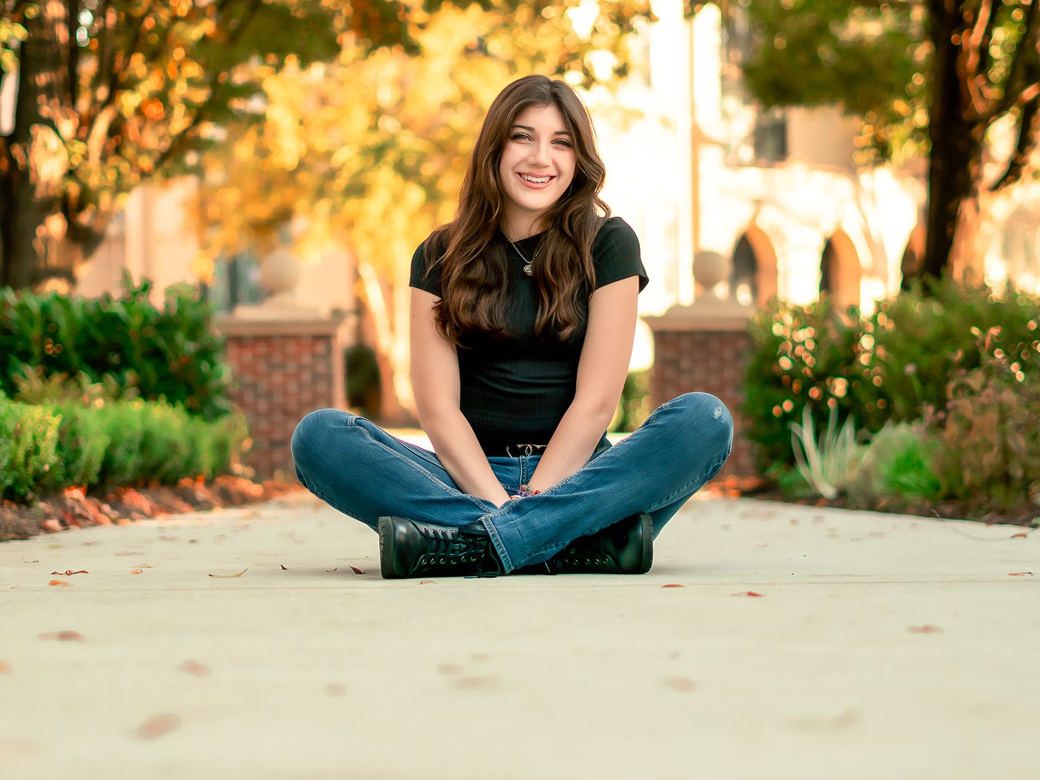 Autumn portrait session in a park during golden hour.