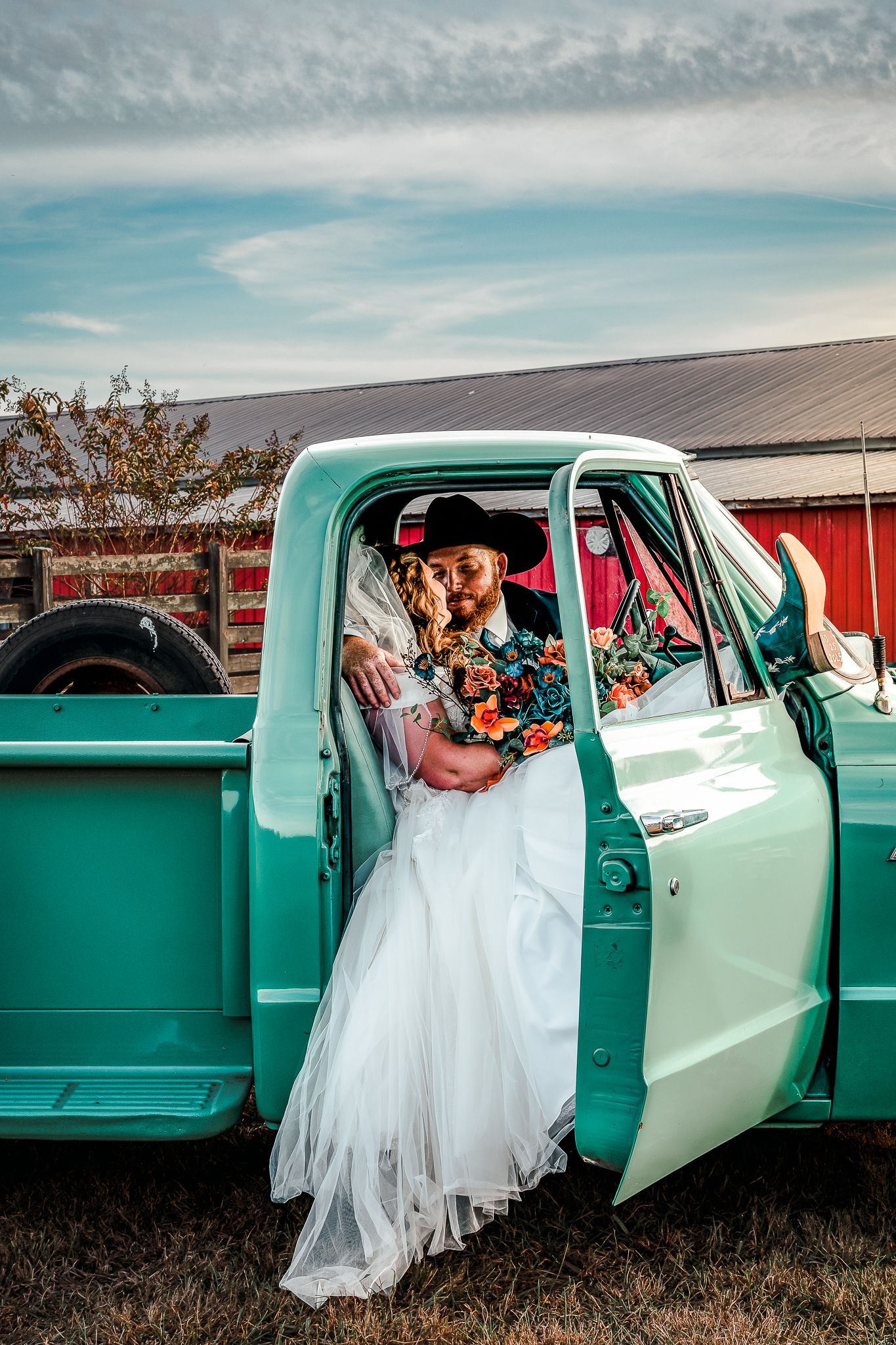 Romantic wedding photos with vintage mint green pickup truck in rustic setting.