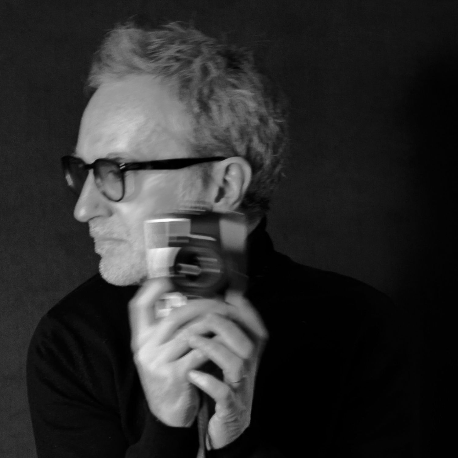 Dramatic black and white portrait series showing artistic angles and shadows.