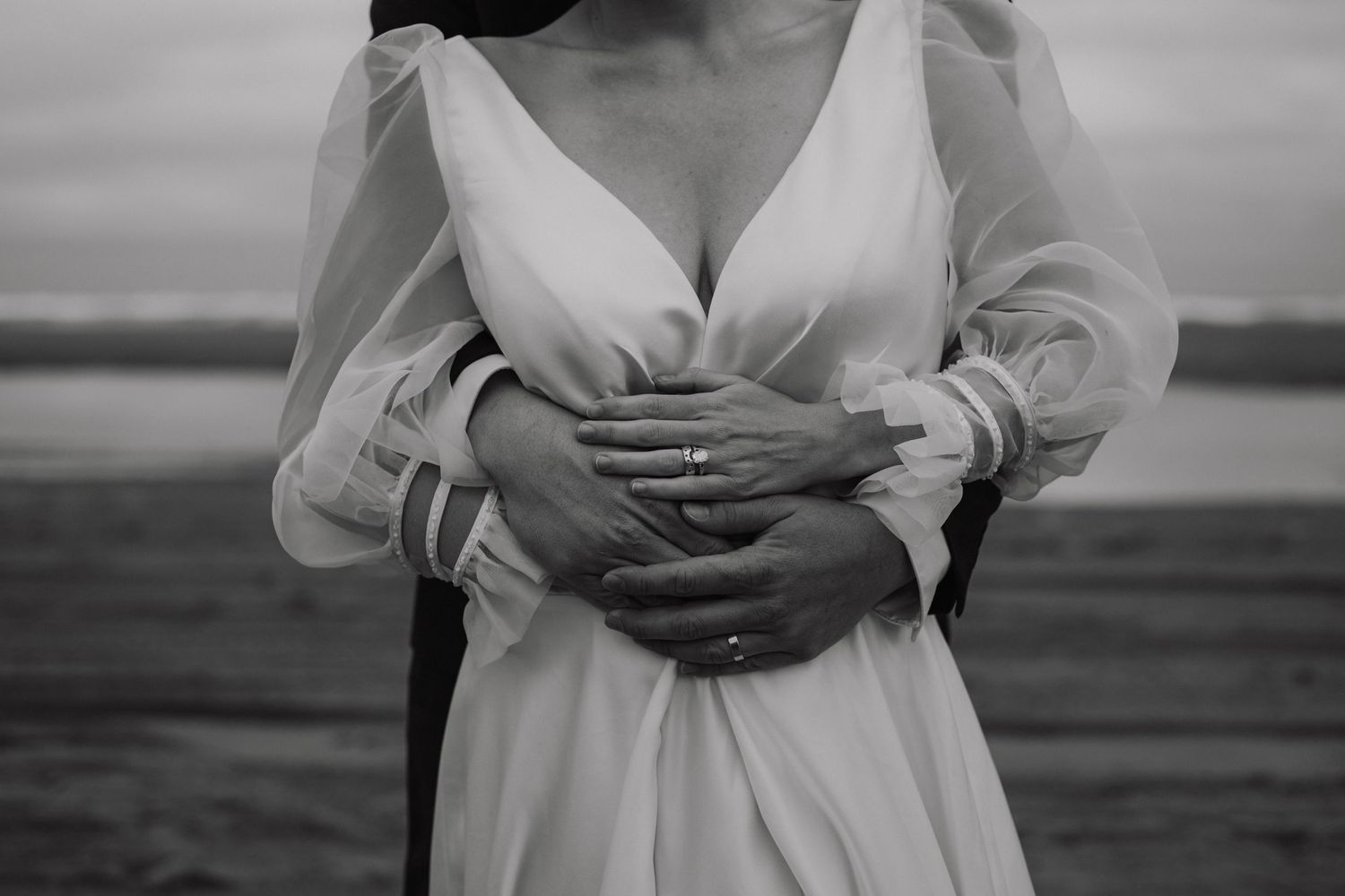 A series of intimate black and white photos showing tender moments between two people.