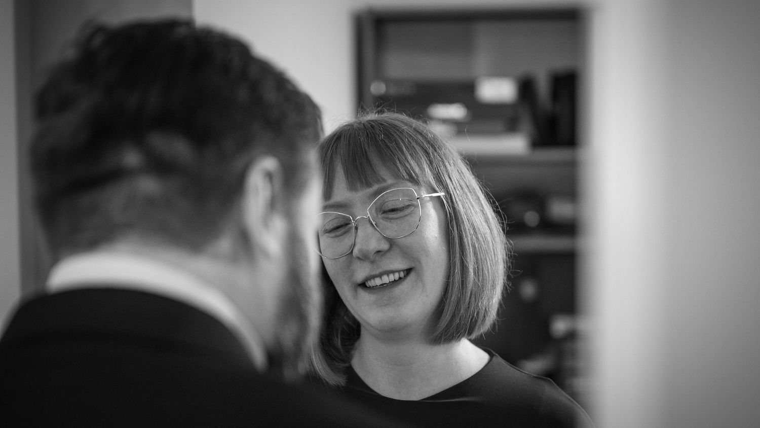 Intimate black and white portrait showing emotional connection between people.