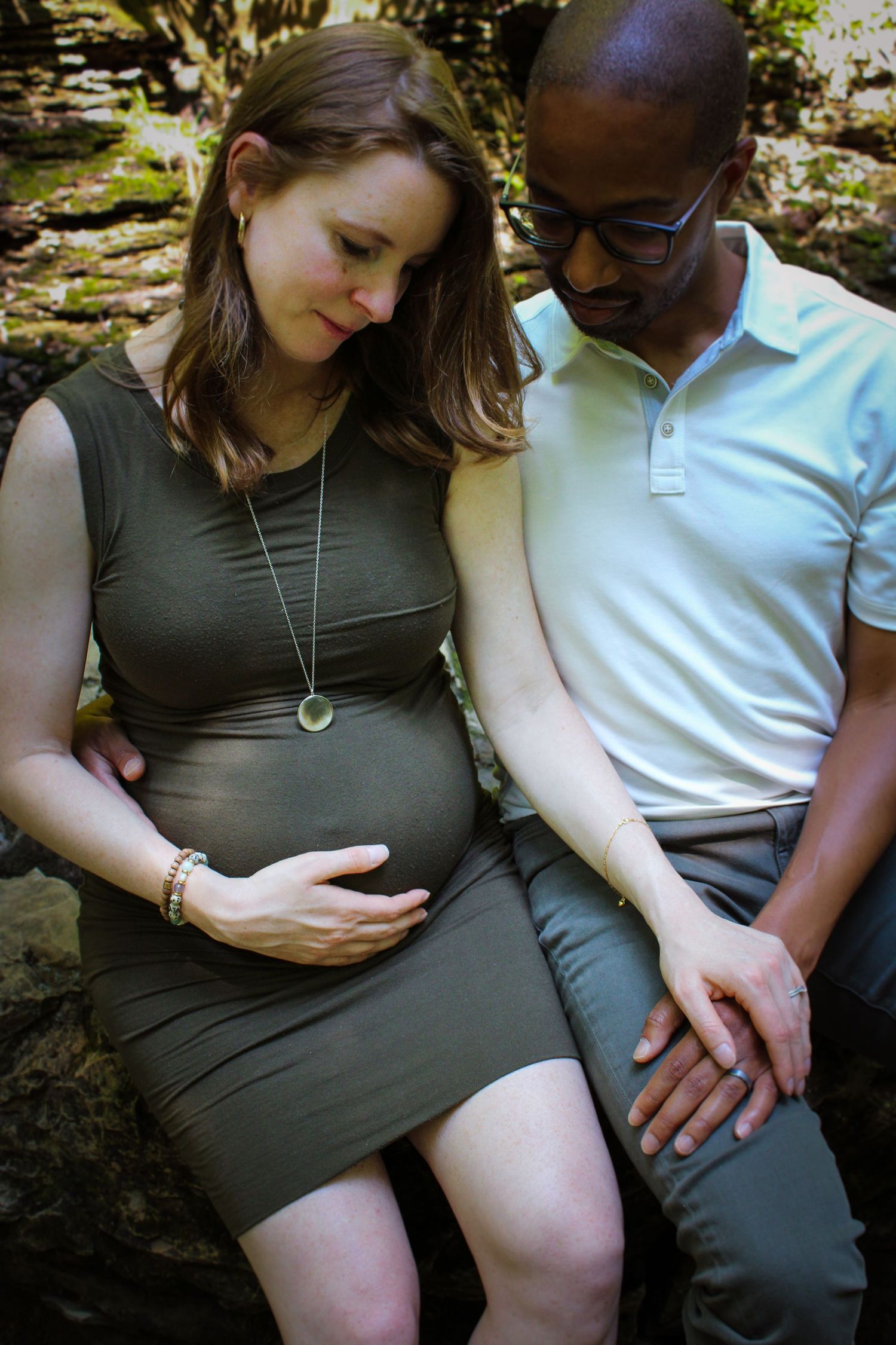 A couple shares an intimate maternity photoshoot moment outdoors showing different poses and angles.
