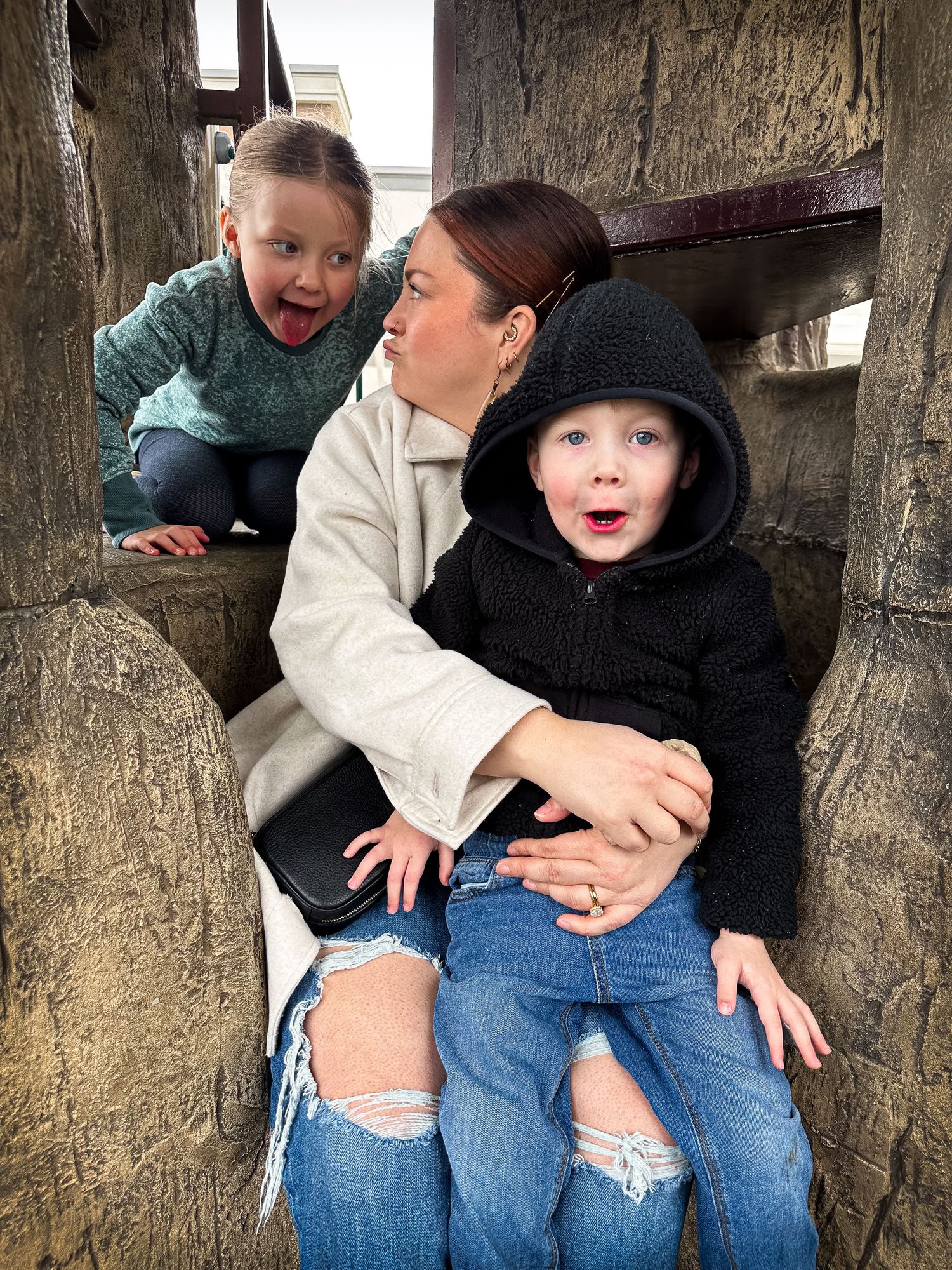 Collage of playful moments between two people sitting in a rustic wooden frame or structure.
