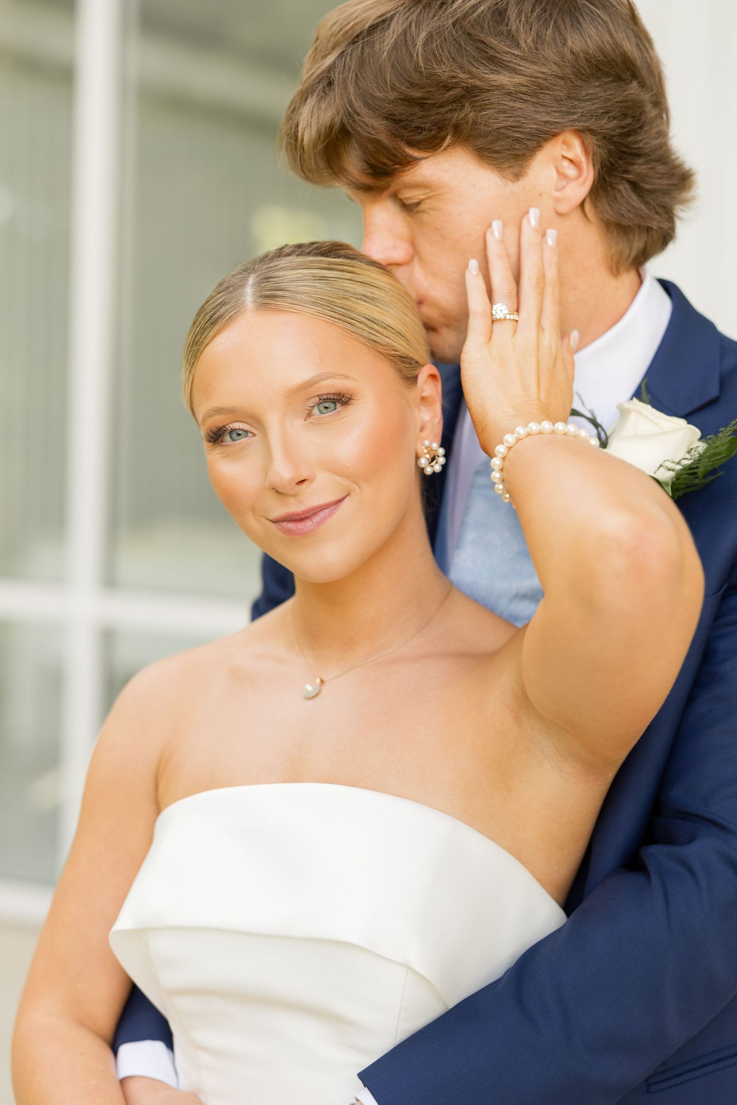 Close-up wedding portraits showing elegant pearl jewelry and formal attire.Cold Springs Events