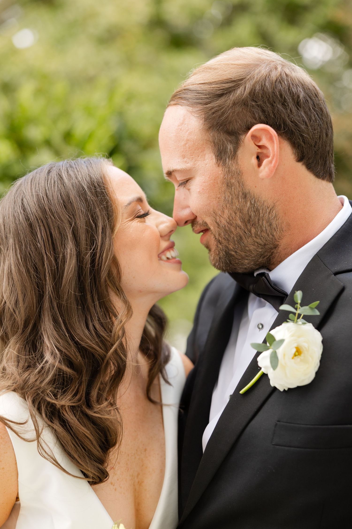 A romantic sequence of wedding photos showing a couple about to kiss in formal attire against a blurred outdoor background.