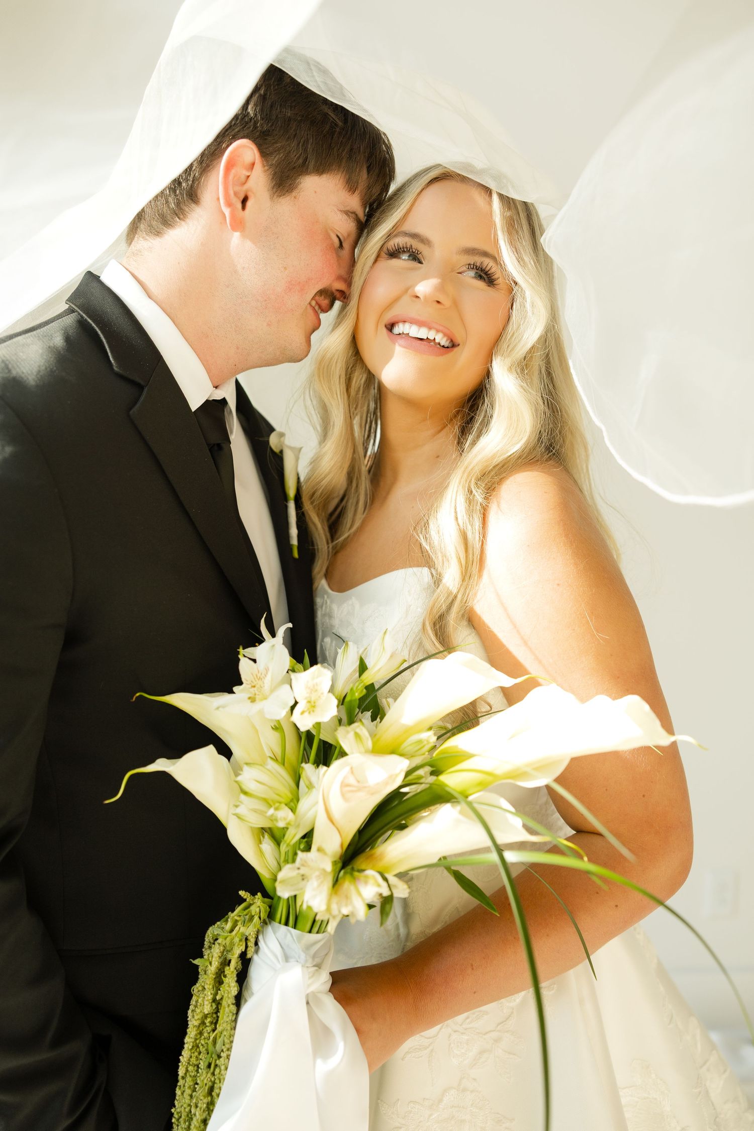 A romantic wedding photo collage showing intimate moments between newlyweds with white lilies in the bouquet.