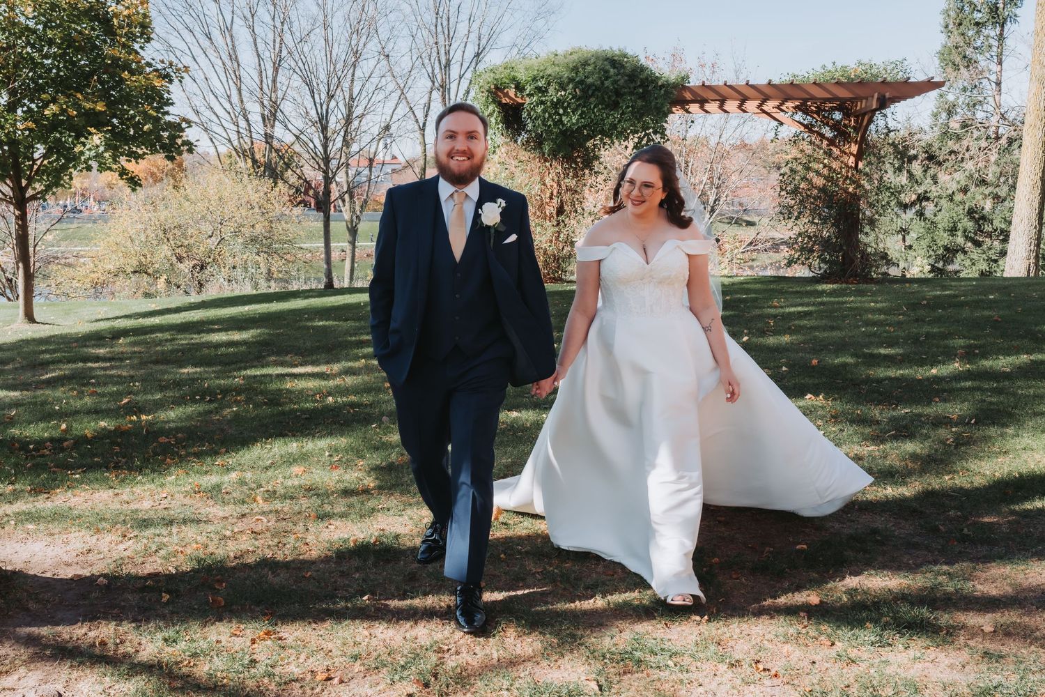Outdoor wedding photography session in a scenic garden landscape.