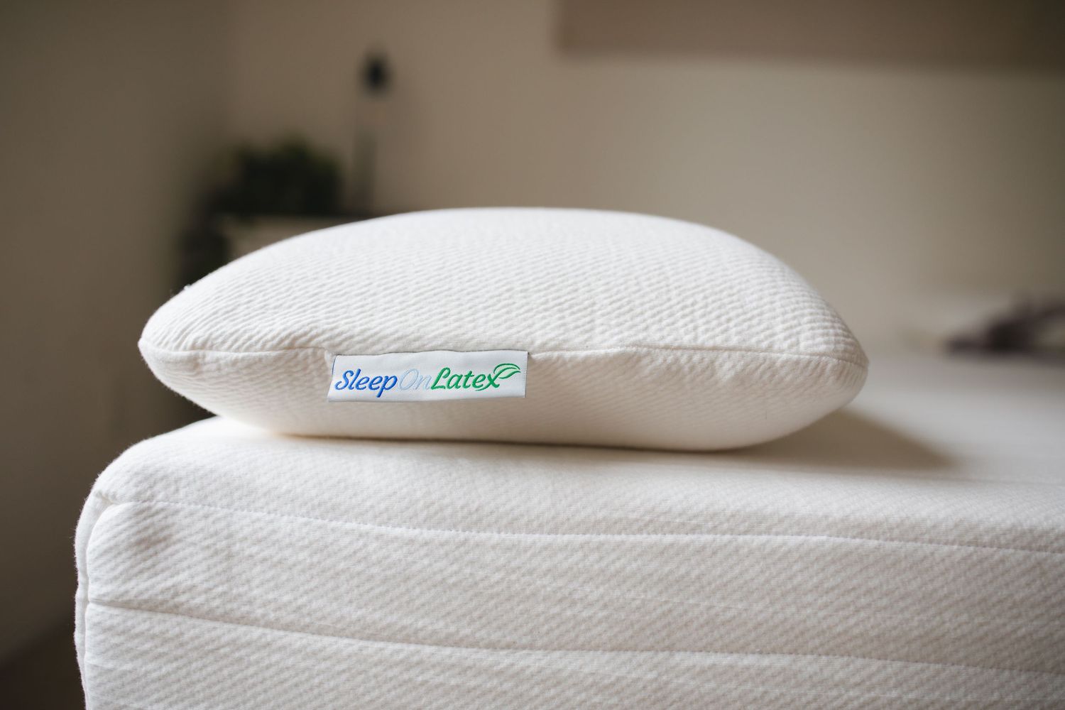 Close-up shots of white mattress tags and labels in sequence.