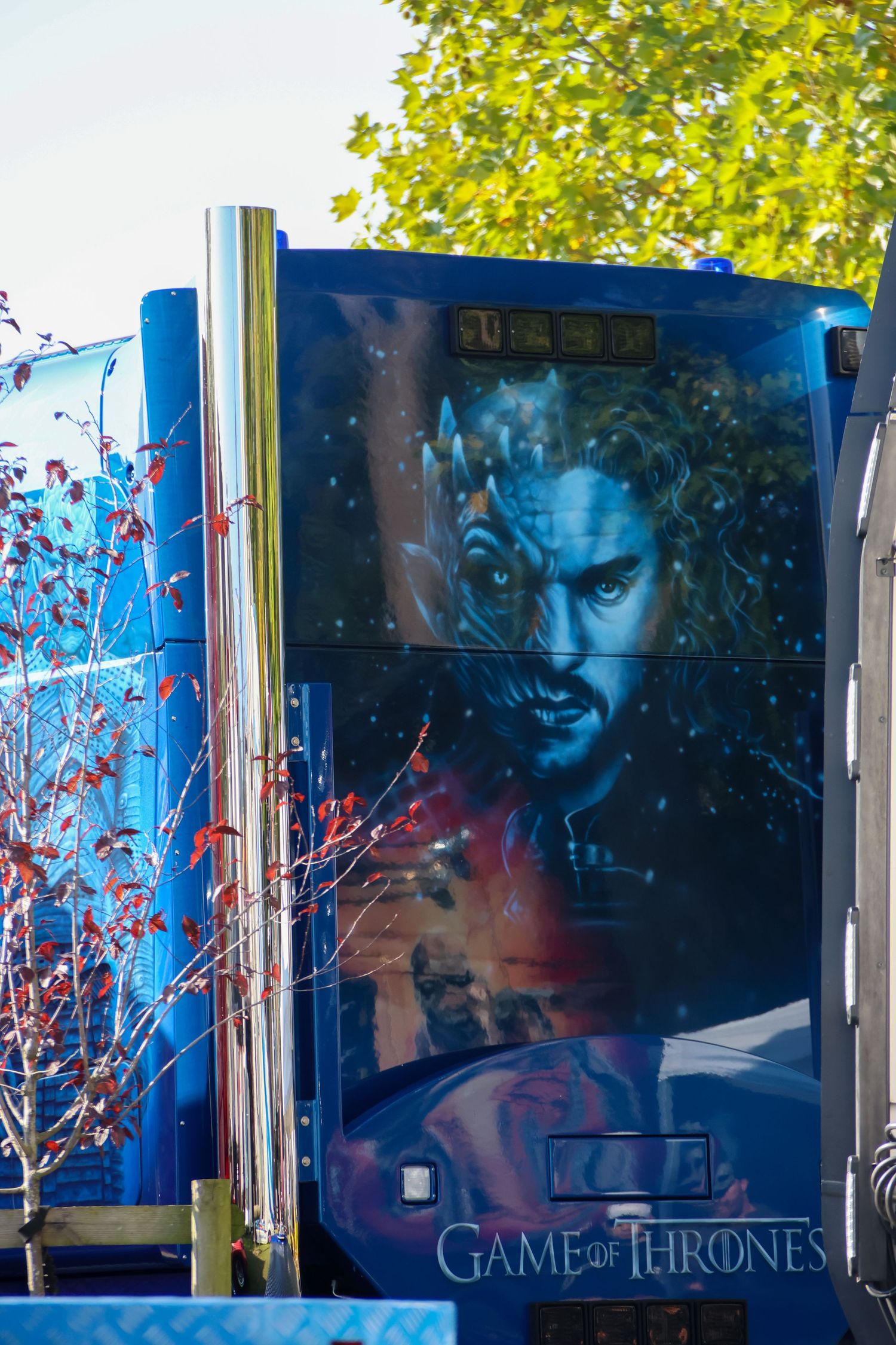 Blue truck trailer featuring a dramatic Game of Thrones airbrushed mural with Jon Snow character artwork.