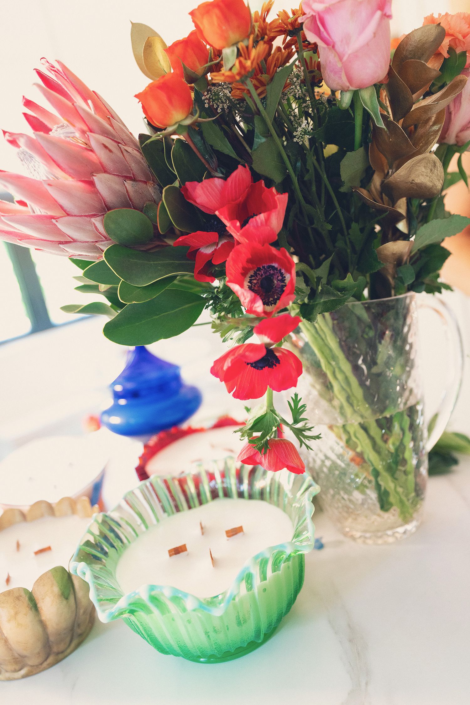 Product photography of candles and flowers