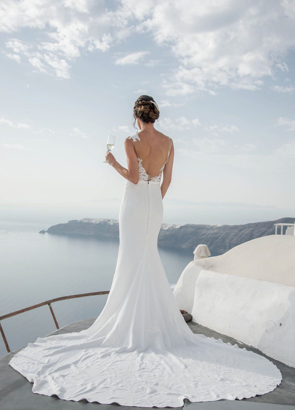 Beautiful bride overviewing Santorini