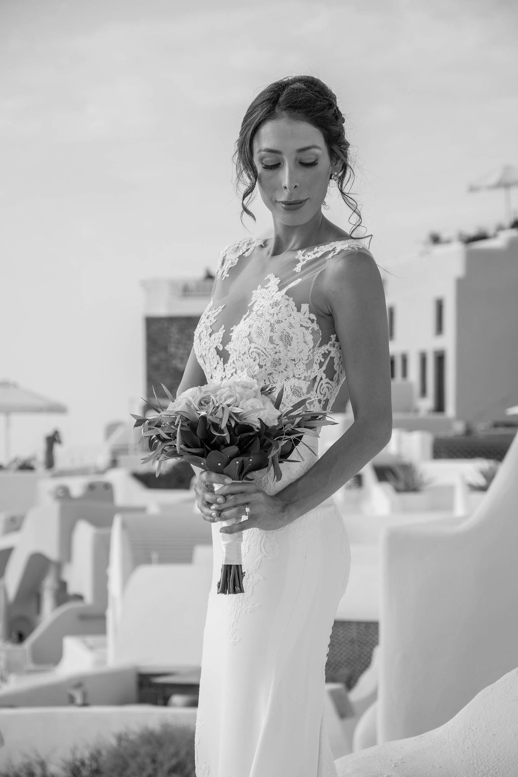 Beautiful bride overviewing Santorini