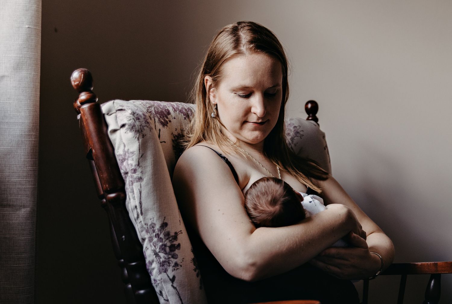Emotional lifestyle photography session capturing quiet nurturing moments.
