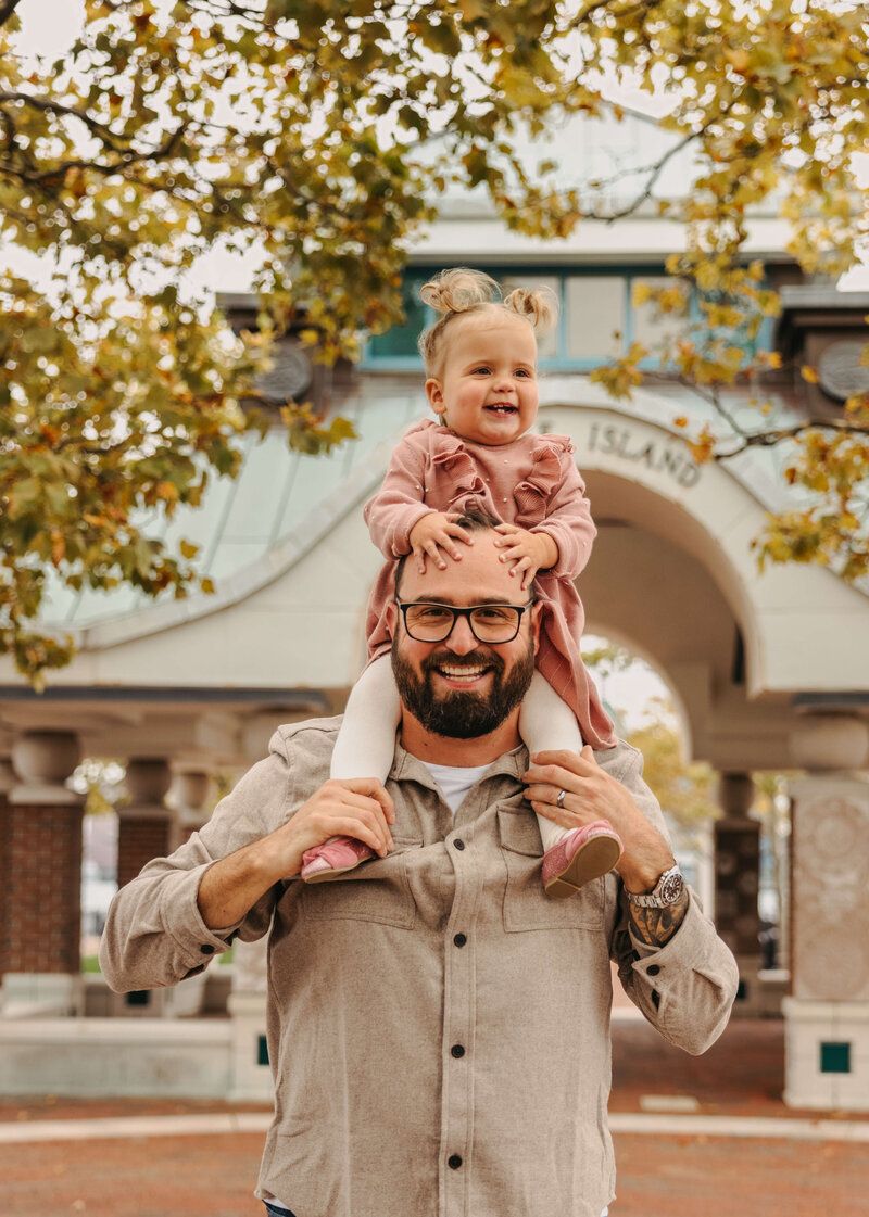 Fun outdoor photo sequence showing playful shoulder rides during autumn.