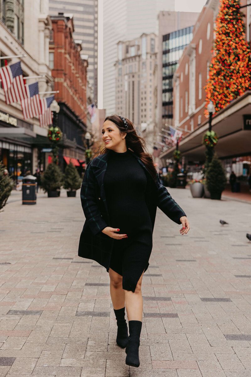 Dynamic urban dance poses captured on a city street with autumn decorations.