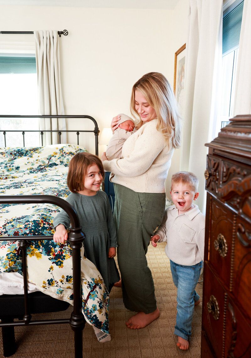 Playful family interaction captured in a series of candid moments by a vintage bed.