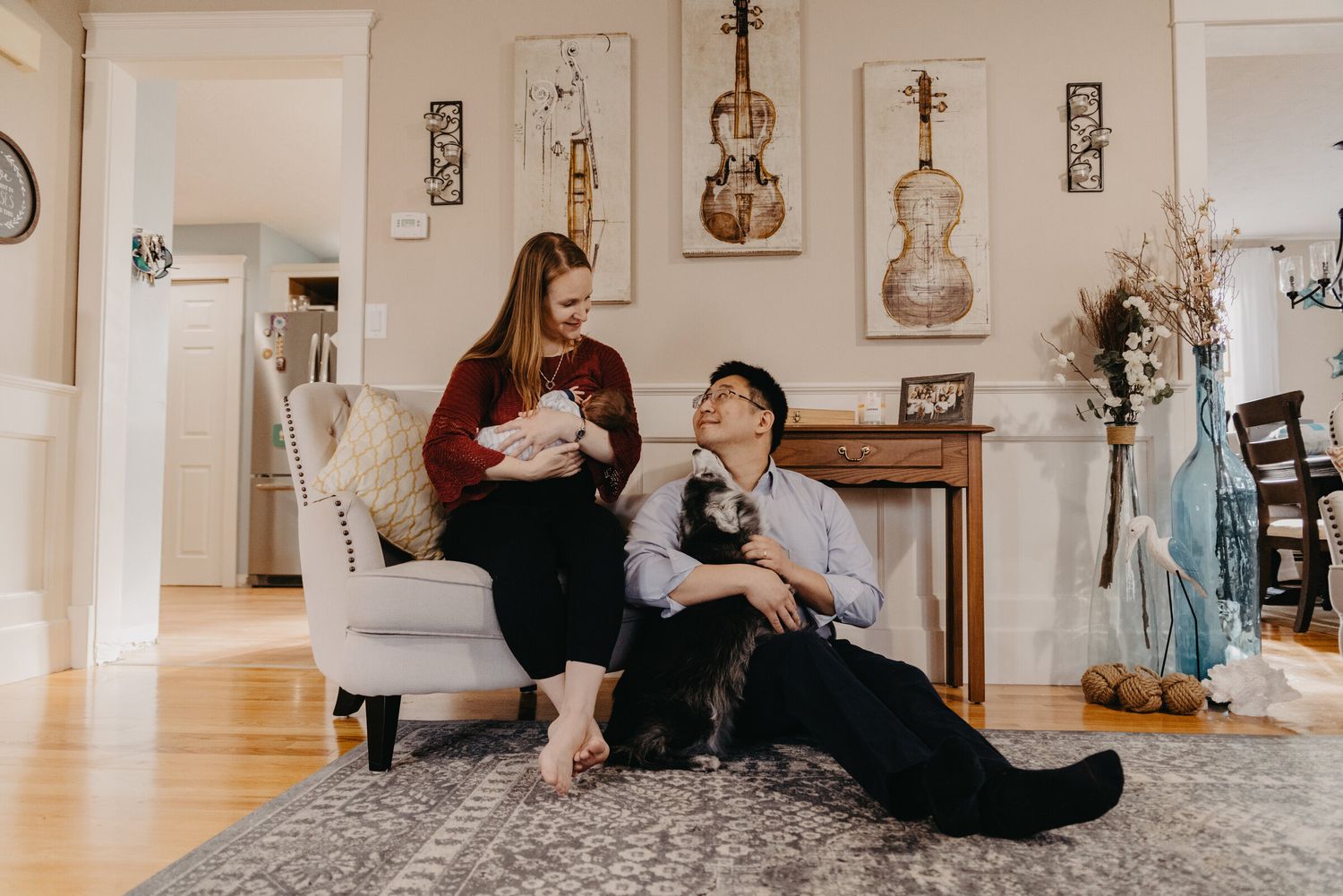 Lifestyle photoshoot with musical instruments and decor hanging on white walls.