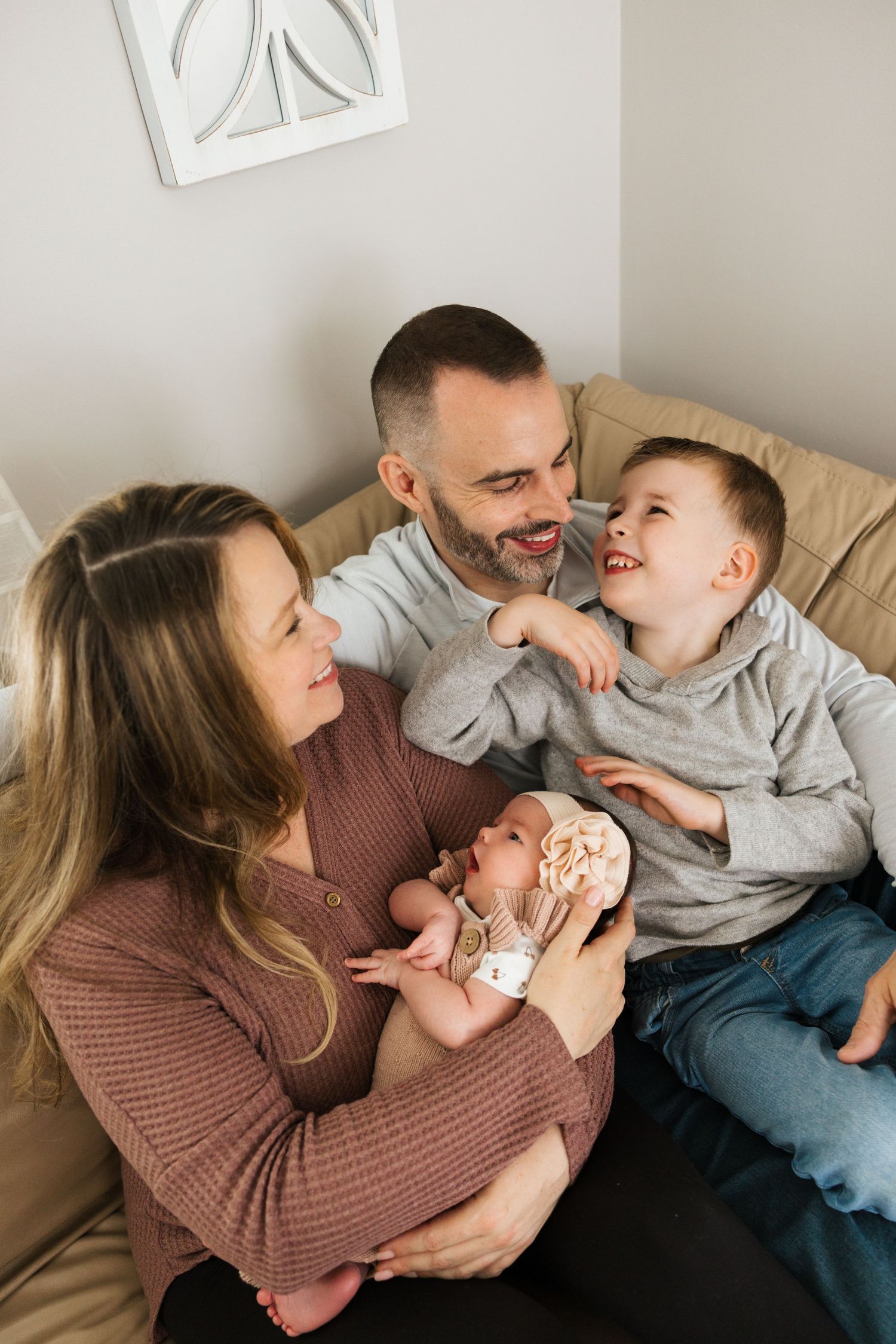 A cozy indoor photography session featuring a warm and intimate mood with soft lighting.