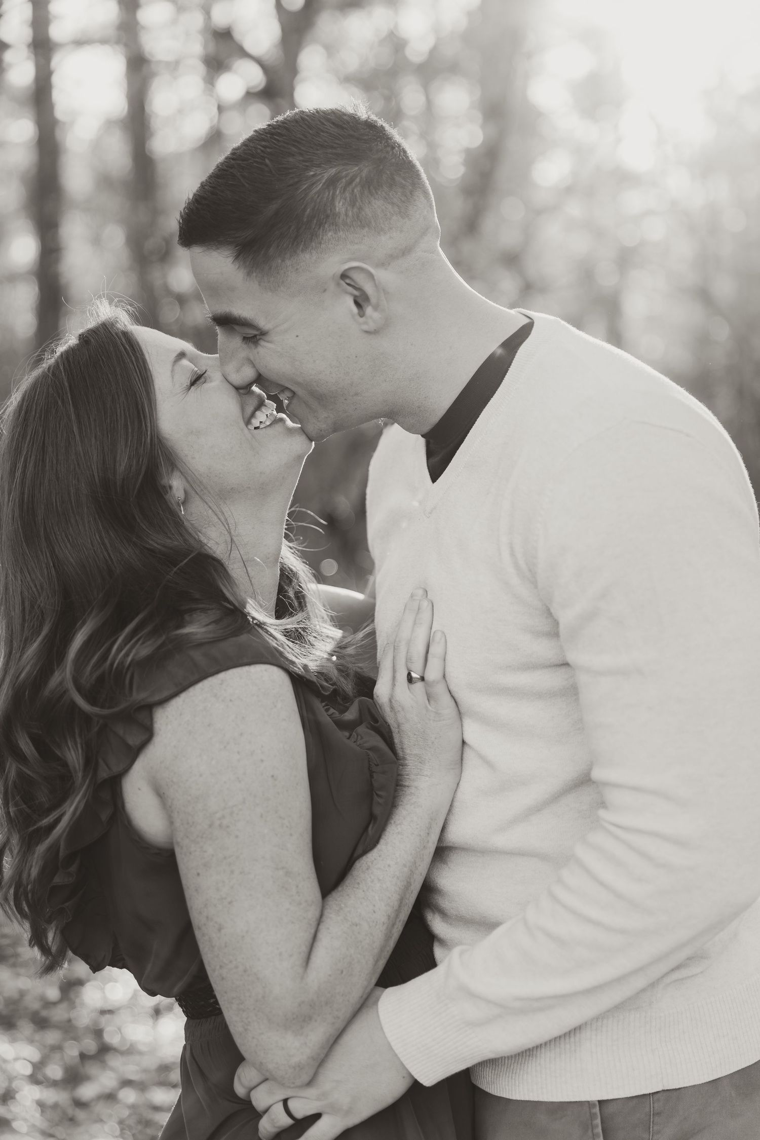 Couple smiling as they are about to kiss