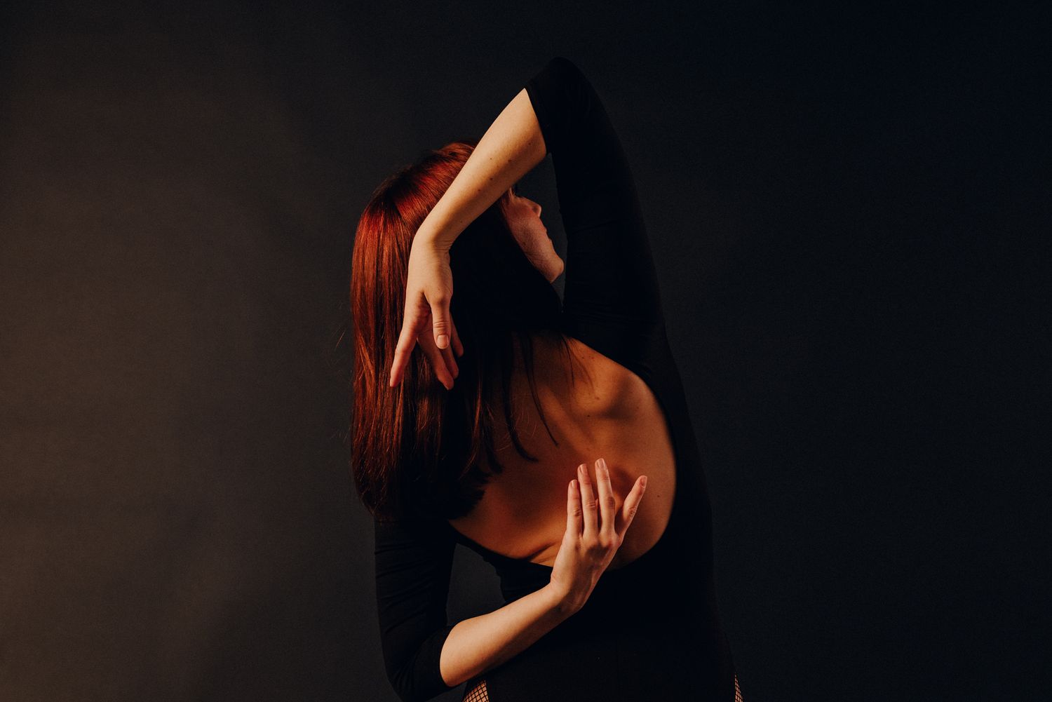 A series of artistic dance poses captured in moody lighting against a dark background.