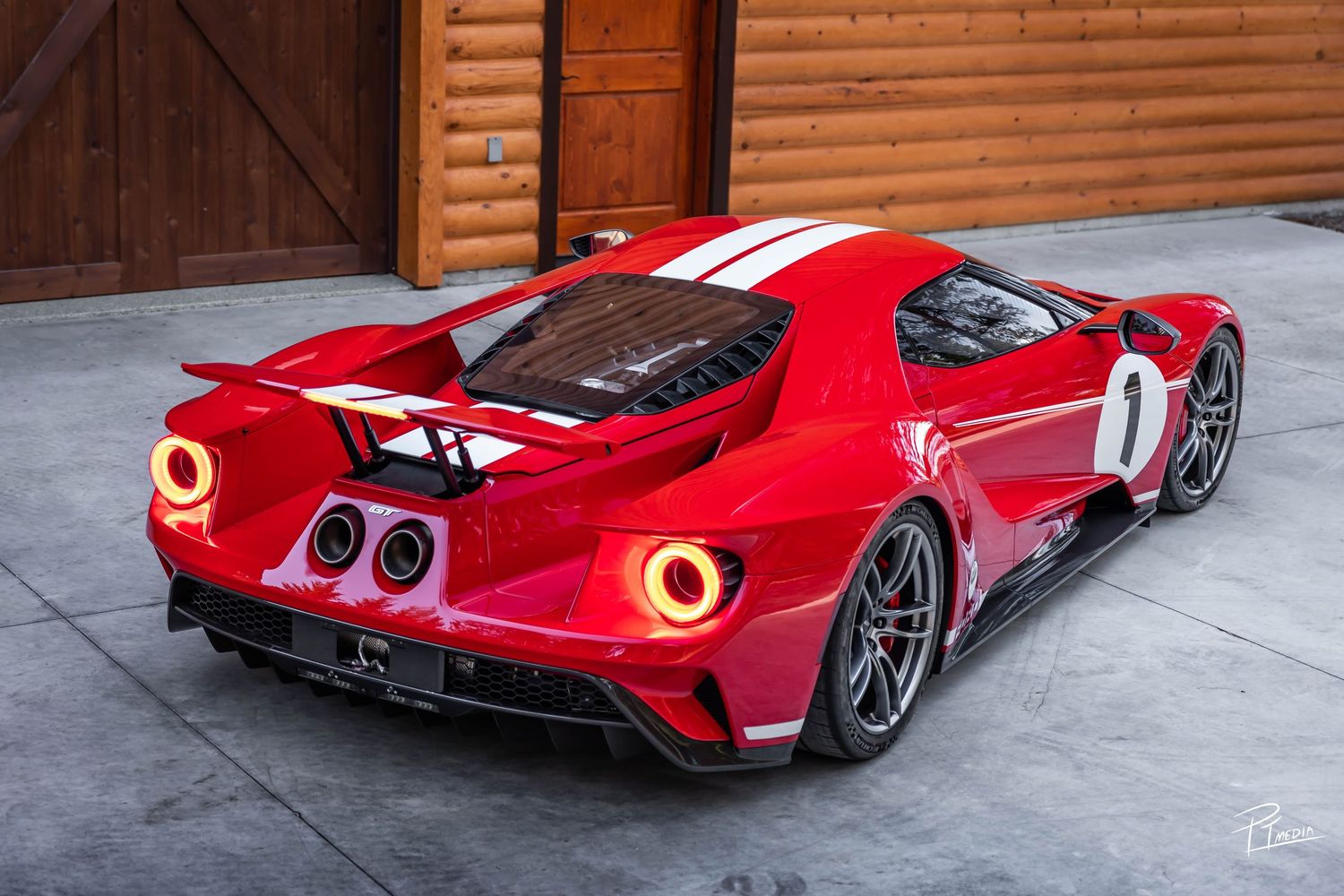 A bright red Ford GT supercar showcased from multiple angles in a photo collage against a concrete background.