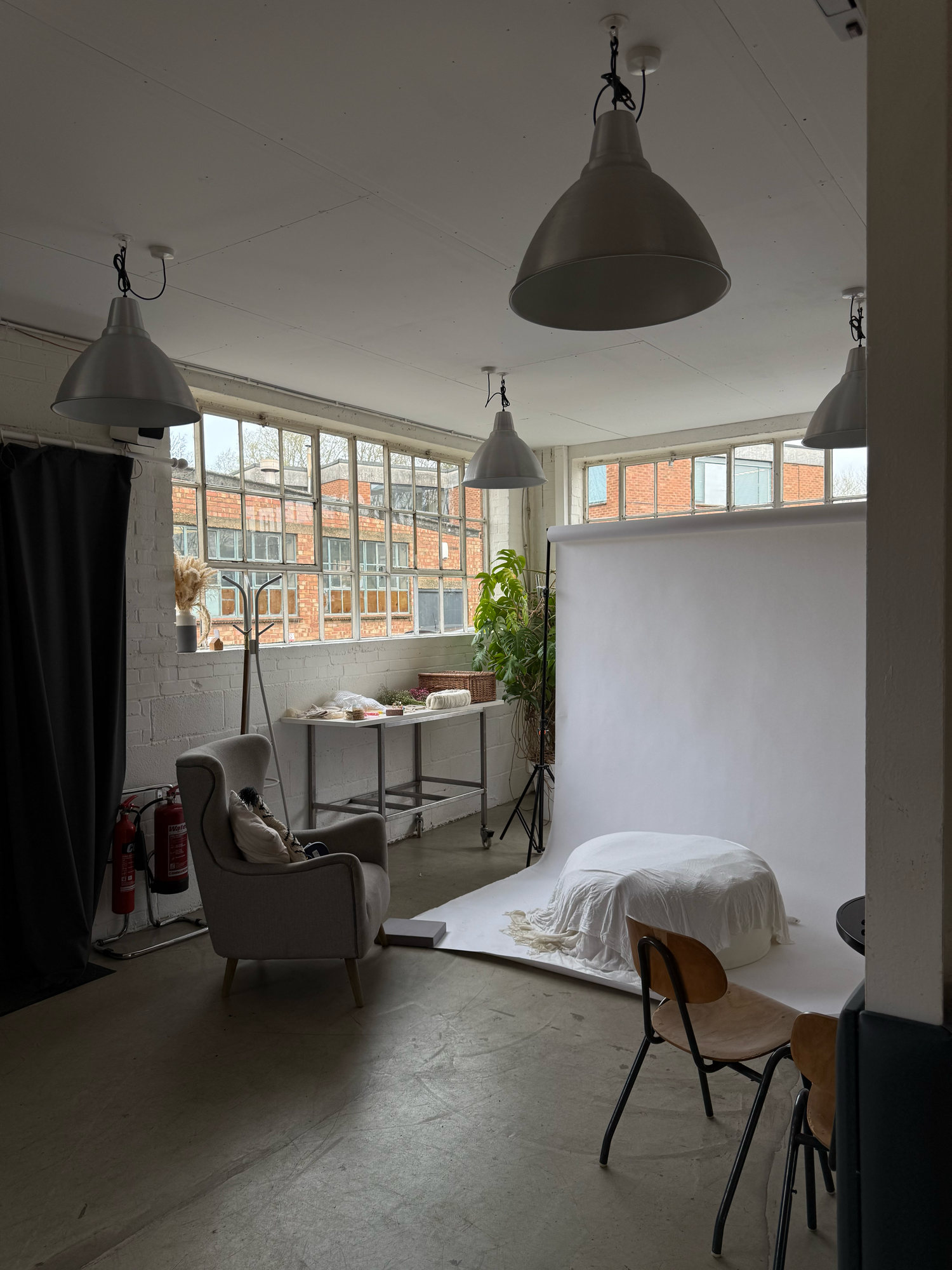 Photo of studio, light, airy background with natural lighting