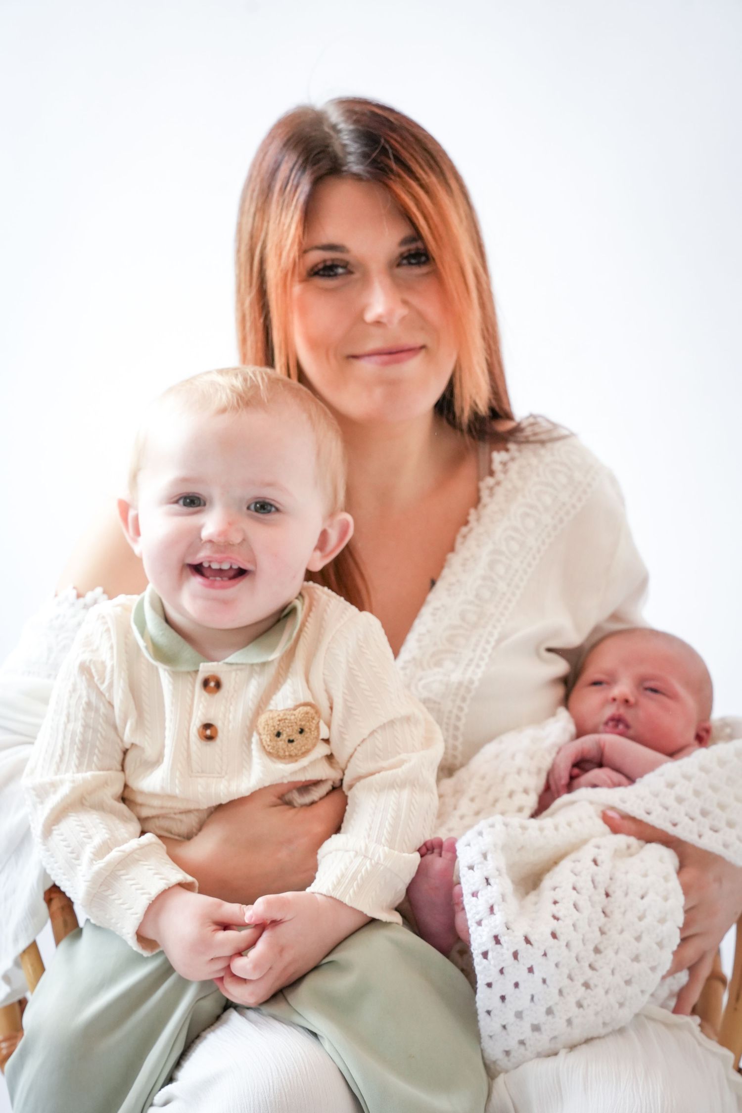 Photo of mum and baby, light, airy background with natural lighting