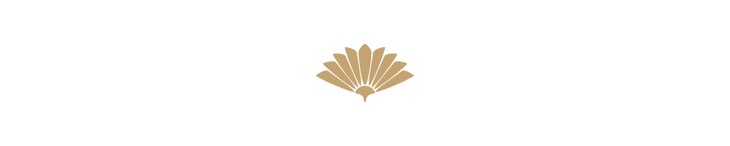 A delicate gold Art Deco fan-shaped decorative emblem logo on a white background.