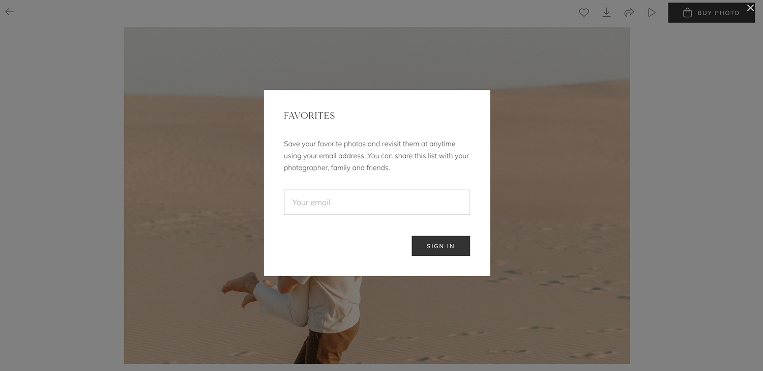 Favorites notification popup prompting user to enter email for saved photo collection.
