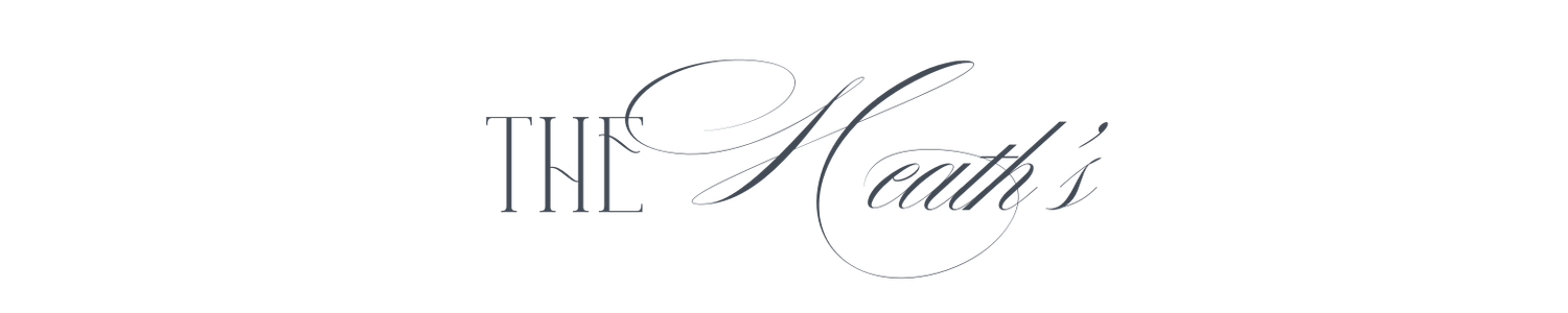 Elegant script logo reading The Heaths in delicate gray typography on a white background.