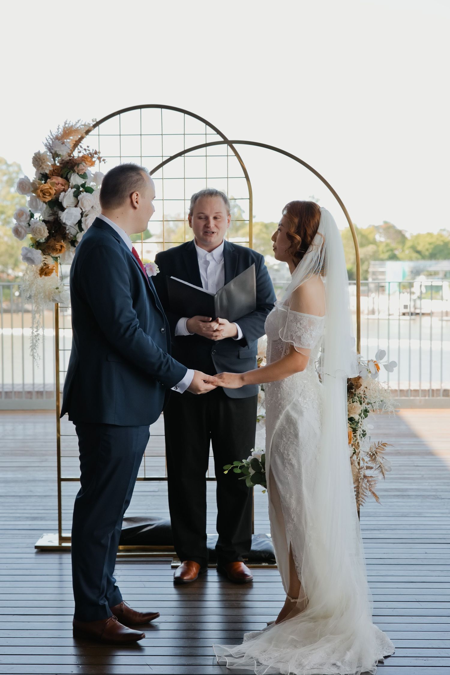 couple getting married, during ceremony with celebrant